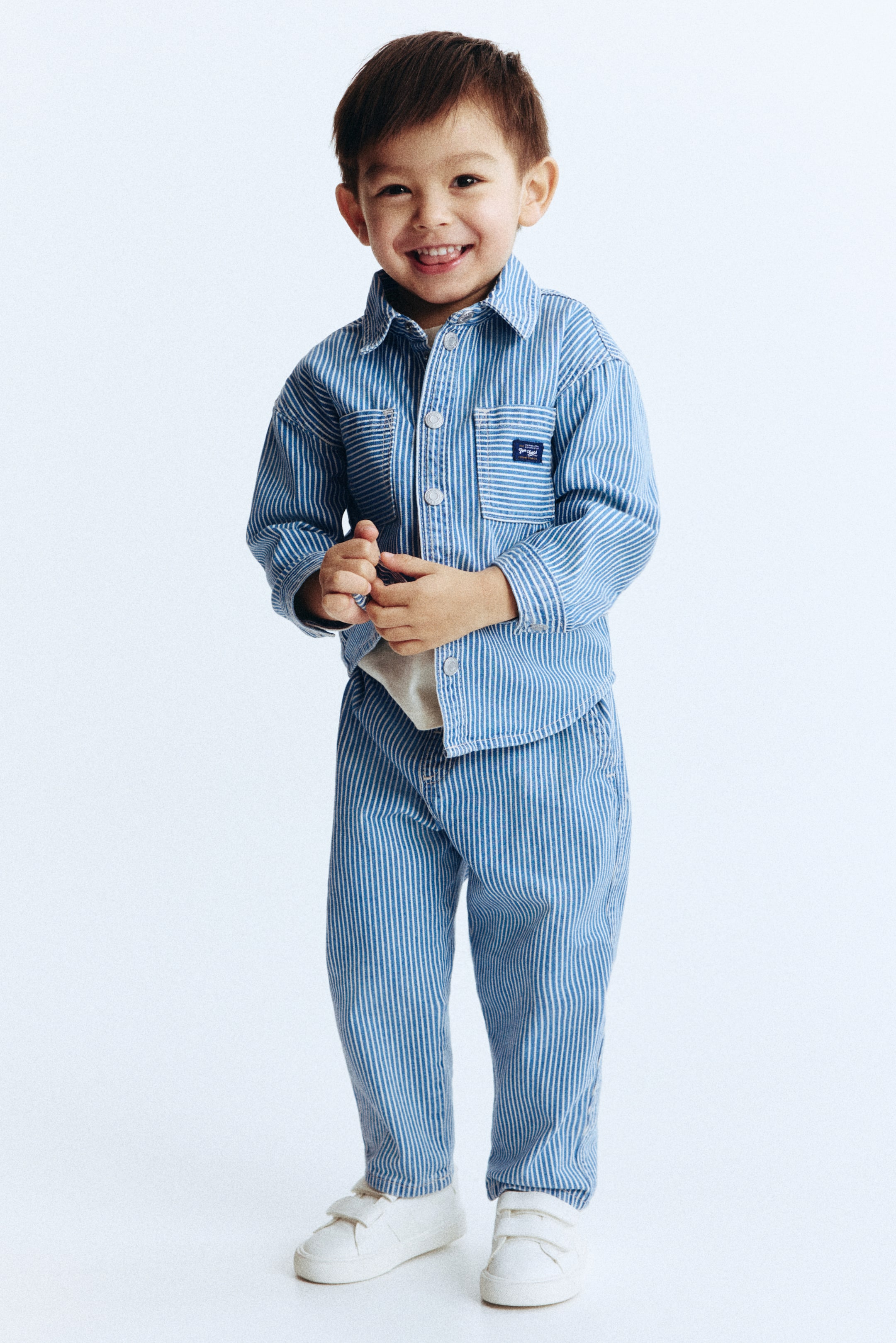 Visualizza immagine più grande: Joggers in twill di cotone - Blu/bianco righe - BAMBINO | H&M IT 1