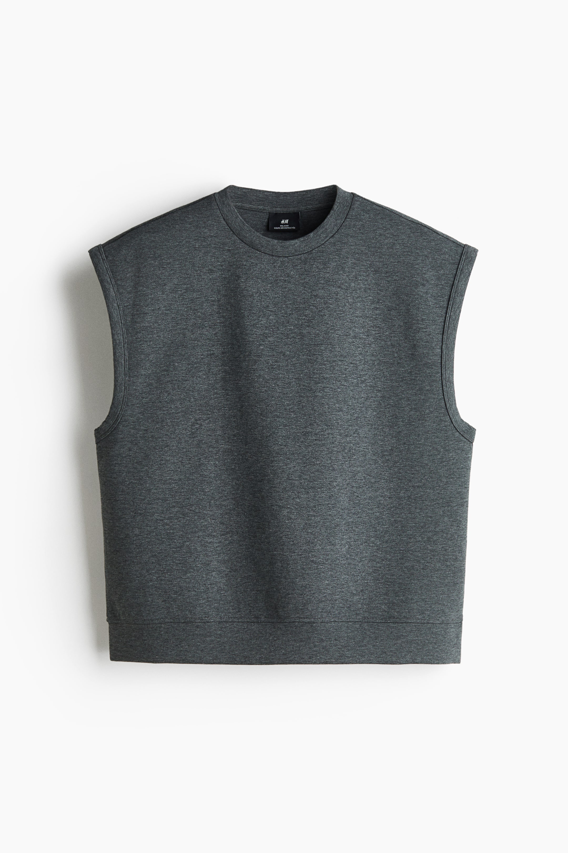 View larger image: A dark grey marled sleeveless sweatshirt is shown from the front, featuring a crew neck, finished armholes, and a ribbed hem band. A black H&M brand tag is visible at the inner back neck.
