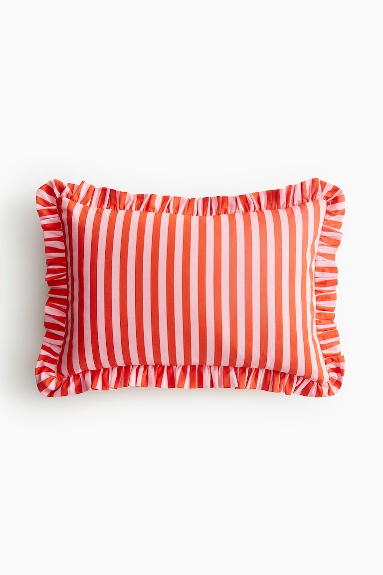 Frill-trimmed cotton cushion cover