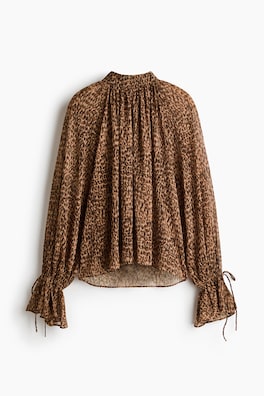 Blus i chiffong med knytdetaljer