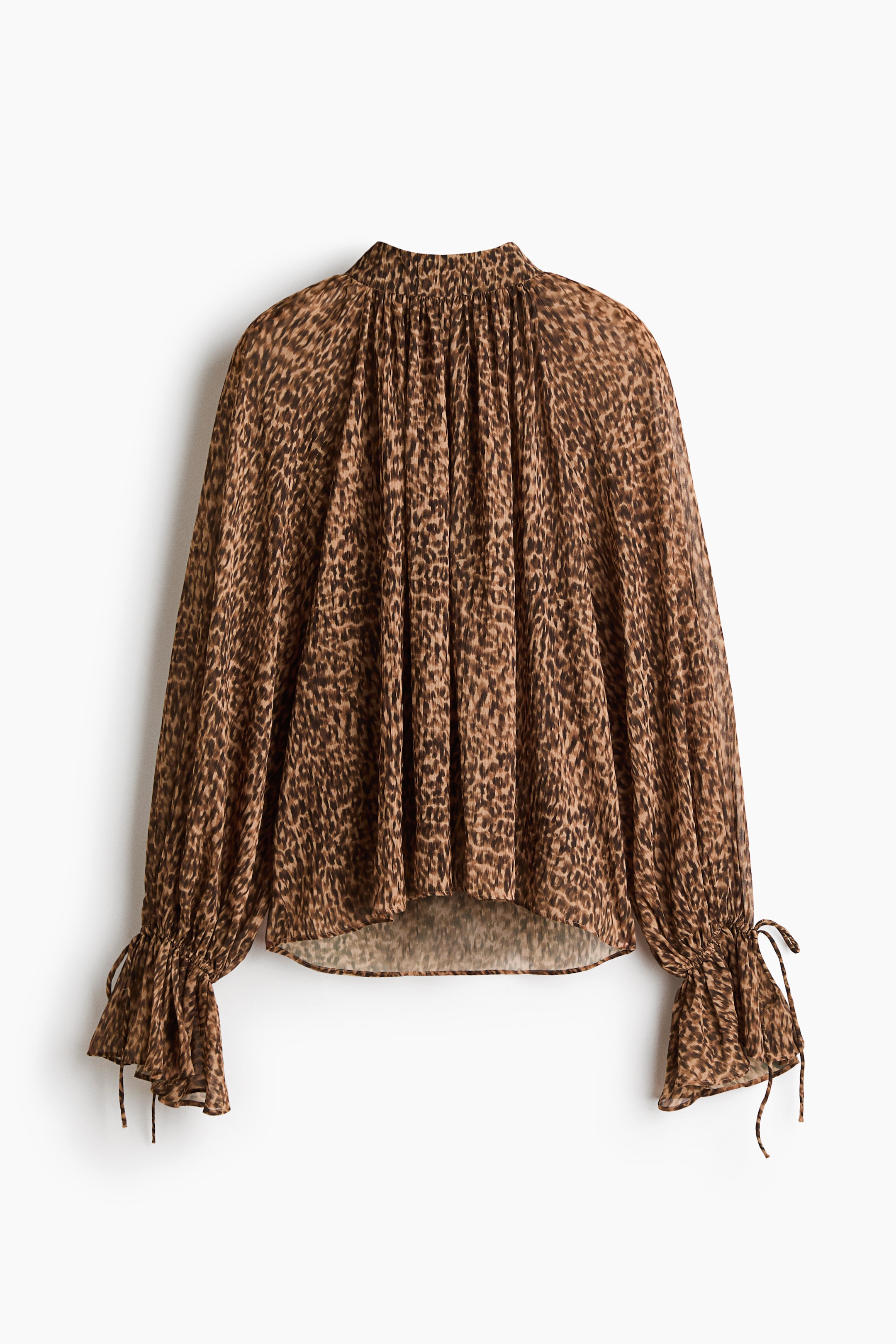 Blouse en mousseline avec détails à nouer