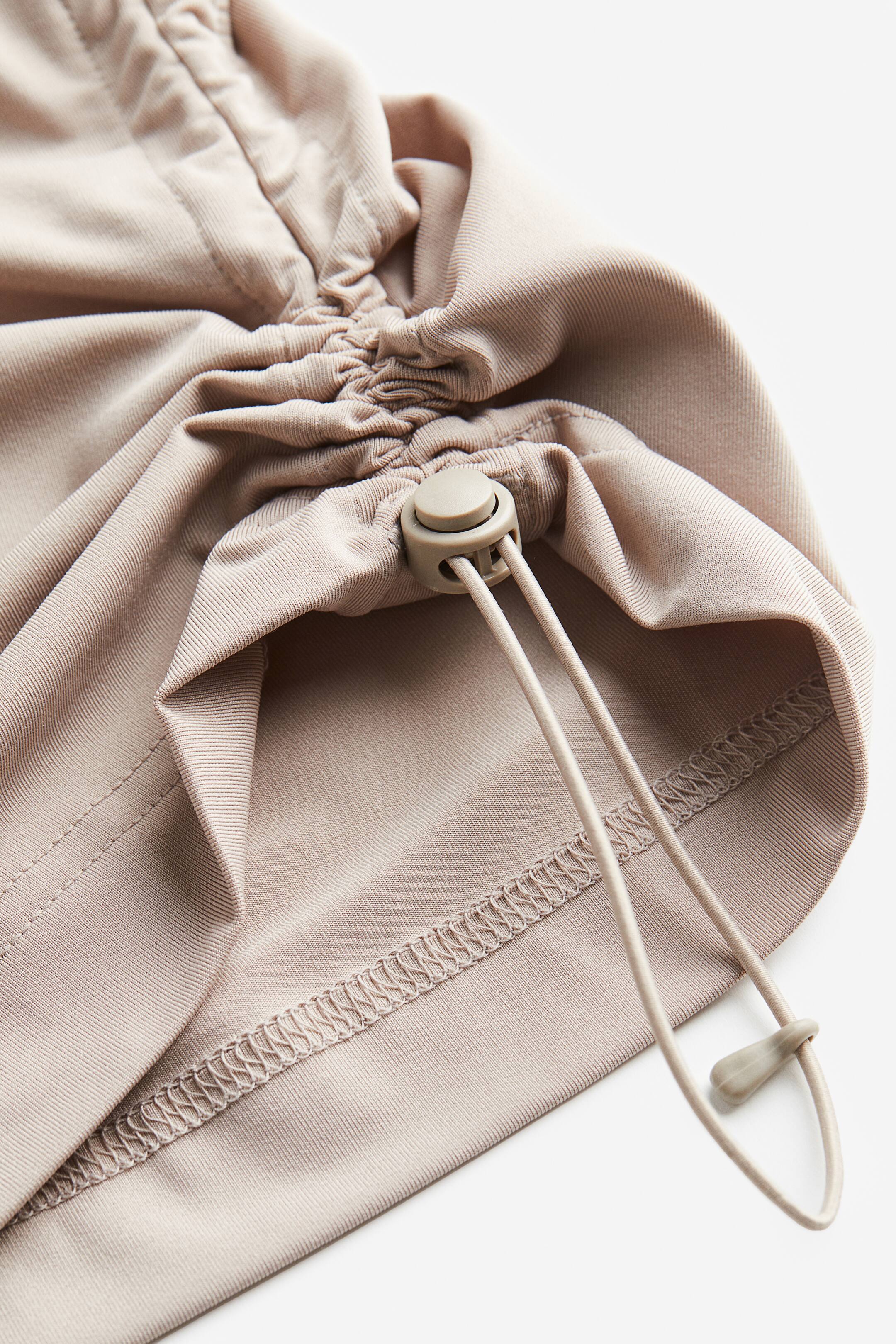 View larger image: DryMove™ Drawstring-detail sports vest top - Light beige - Ladies | H&M HK 2