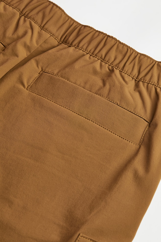 Loose Fit Water-repellent outdoor trousers - Brown - 8