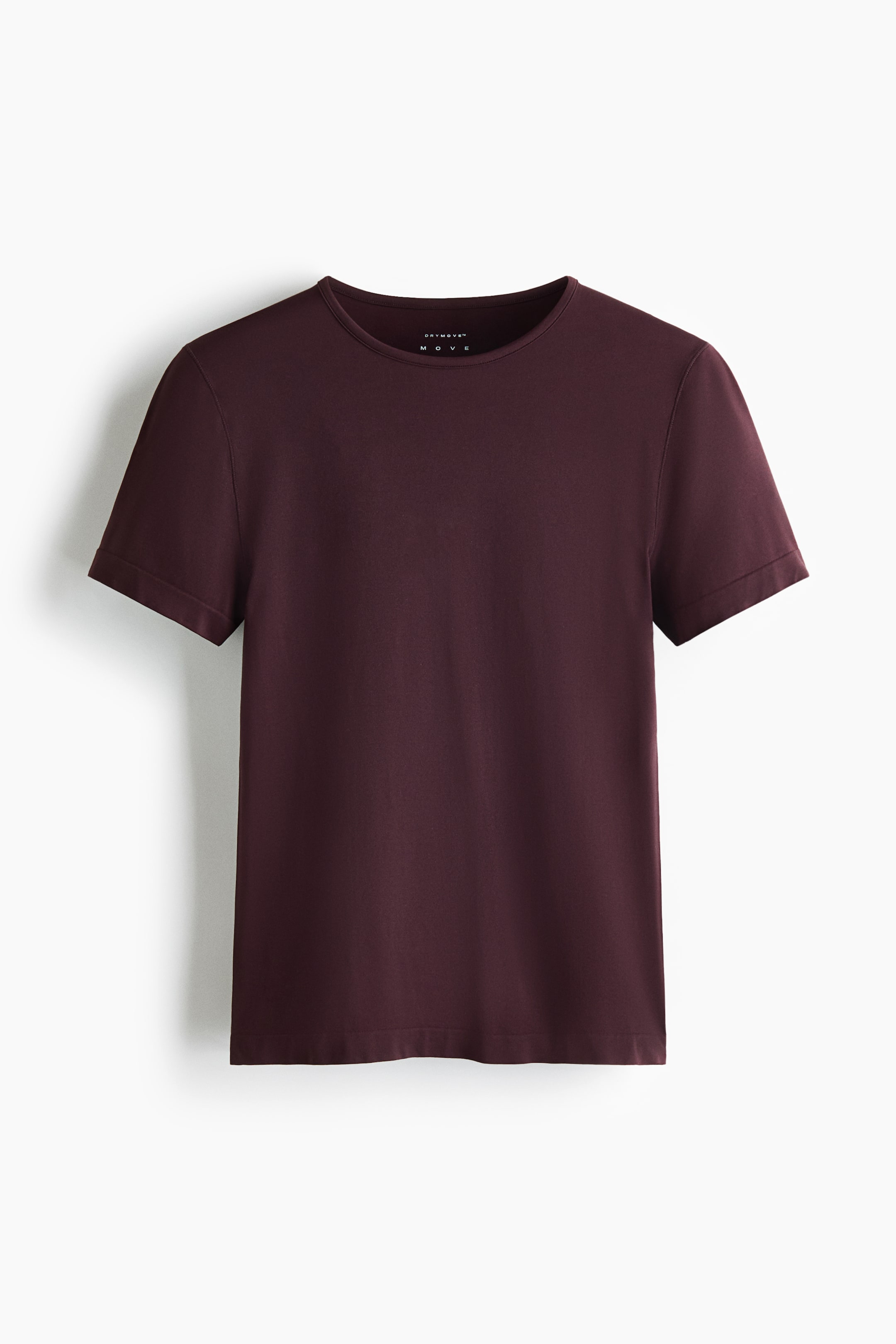 View larger image: The front of a maroon t-shirt showcases a plain, smooth fabric, featuring a round neckline and short sleeves.