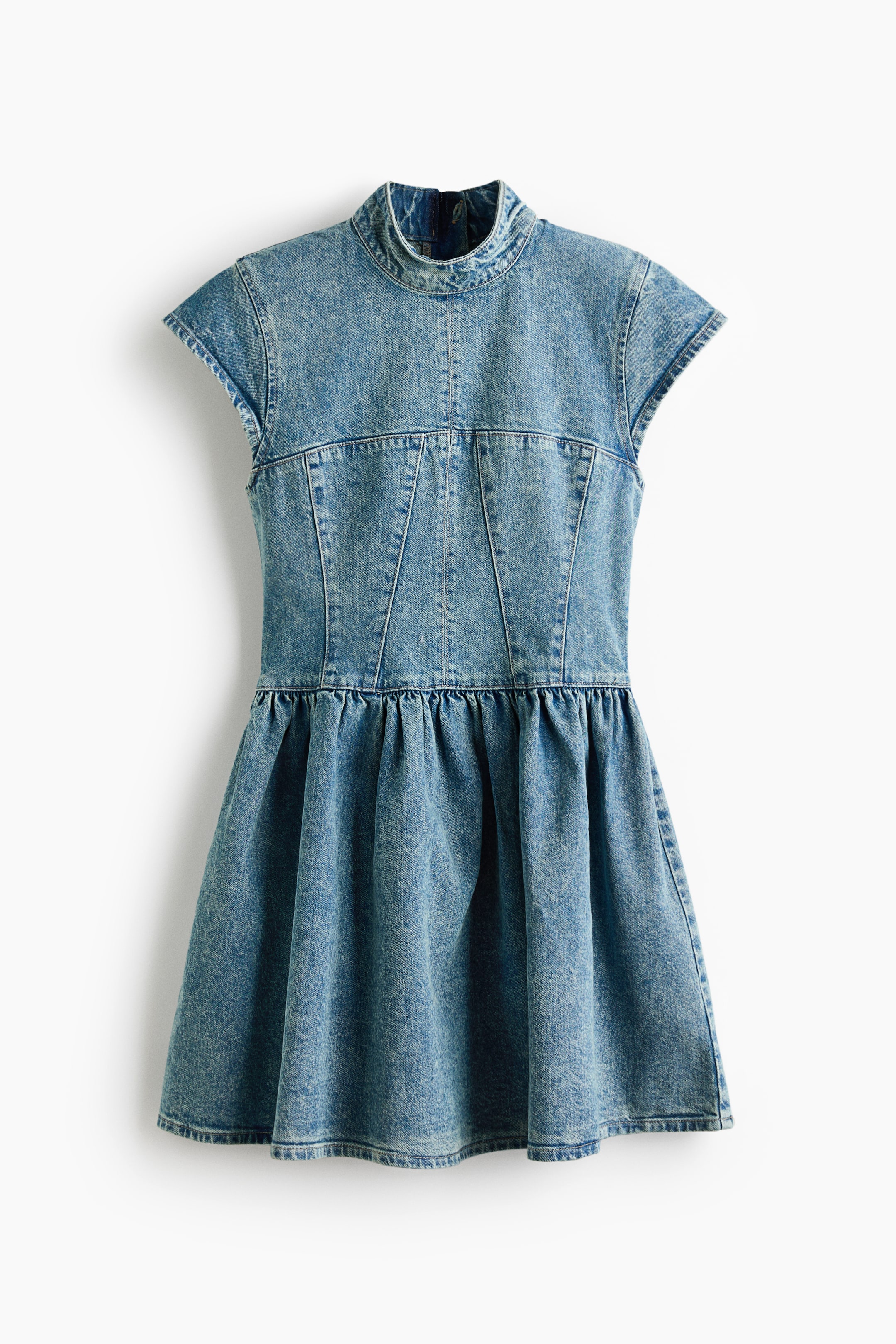 View larger image: The short dress, crafted from sturdy cotton denim, showcases a stand collar, cap sleeves, and shaping seams on the front. It also features a gathered seam at the waist, complemented by a flared skirt.