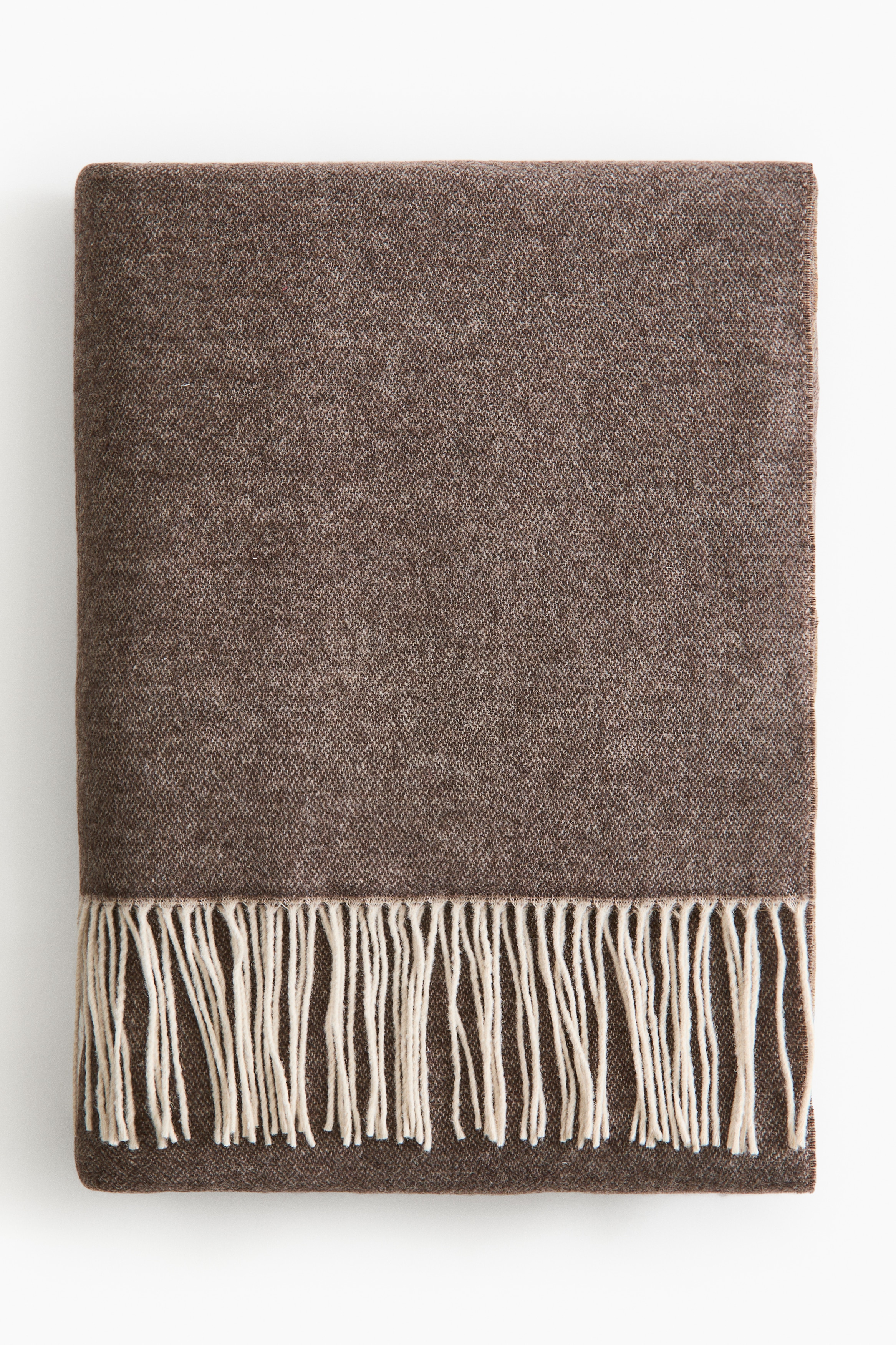 Fringed wool-blend blanketModel