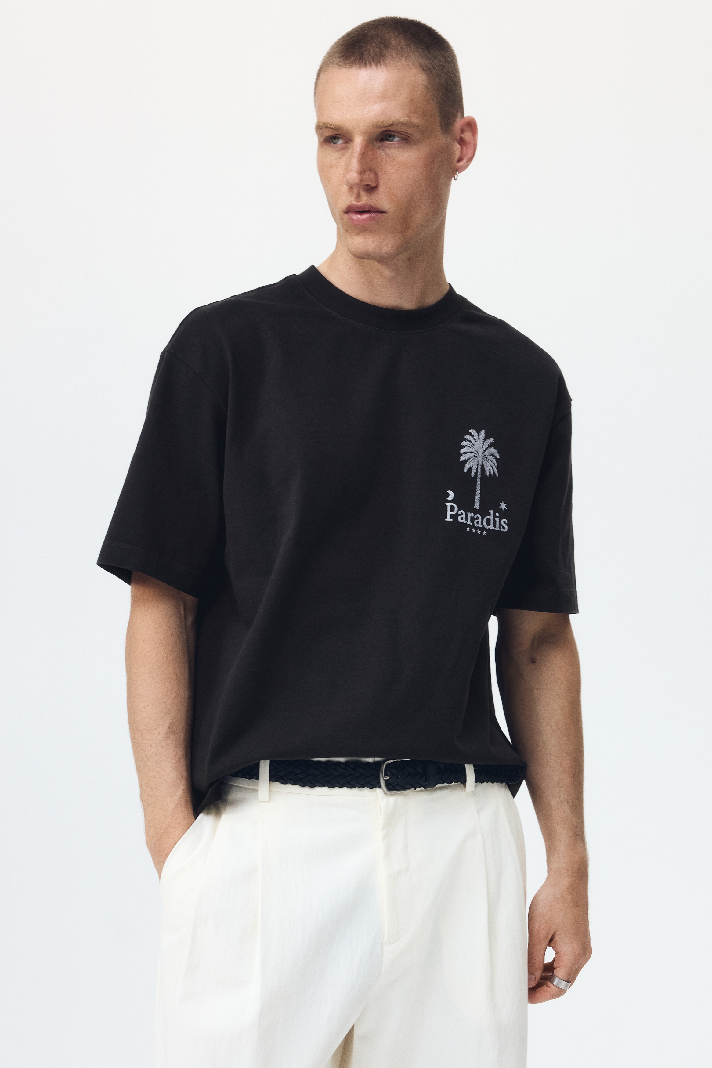 Men's Black/Paradis Relaxed-Fit Printed Cotton T-Shirt | H&M US Men's Black/Paradis Relaxed-Fit Printed Cotton T-Shirt | H&M US