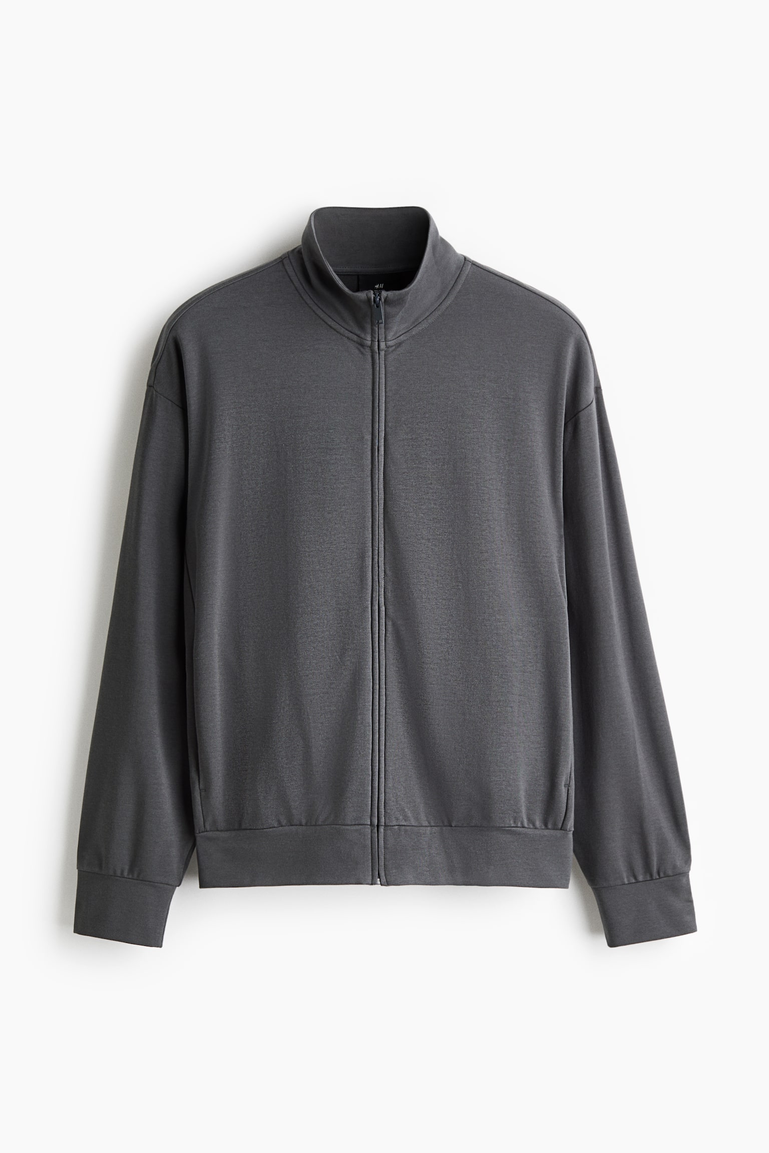 A dark grey sweat jacket is facing the front, showcasing a relaxed fit with a stand collar and a full-length front zipper. The jacket is featuring dropped shoulders, long sleeves with wide cuffs, and a wide hem. - 1