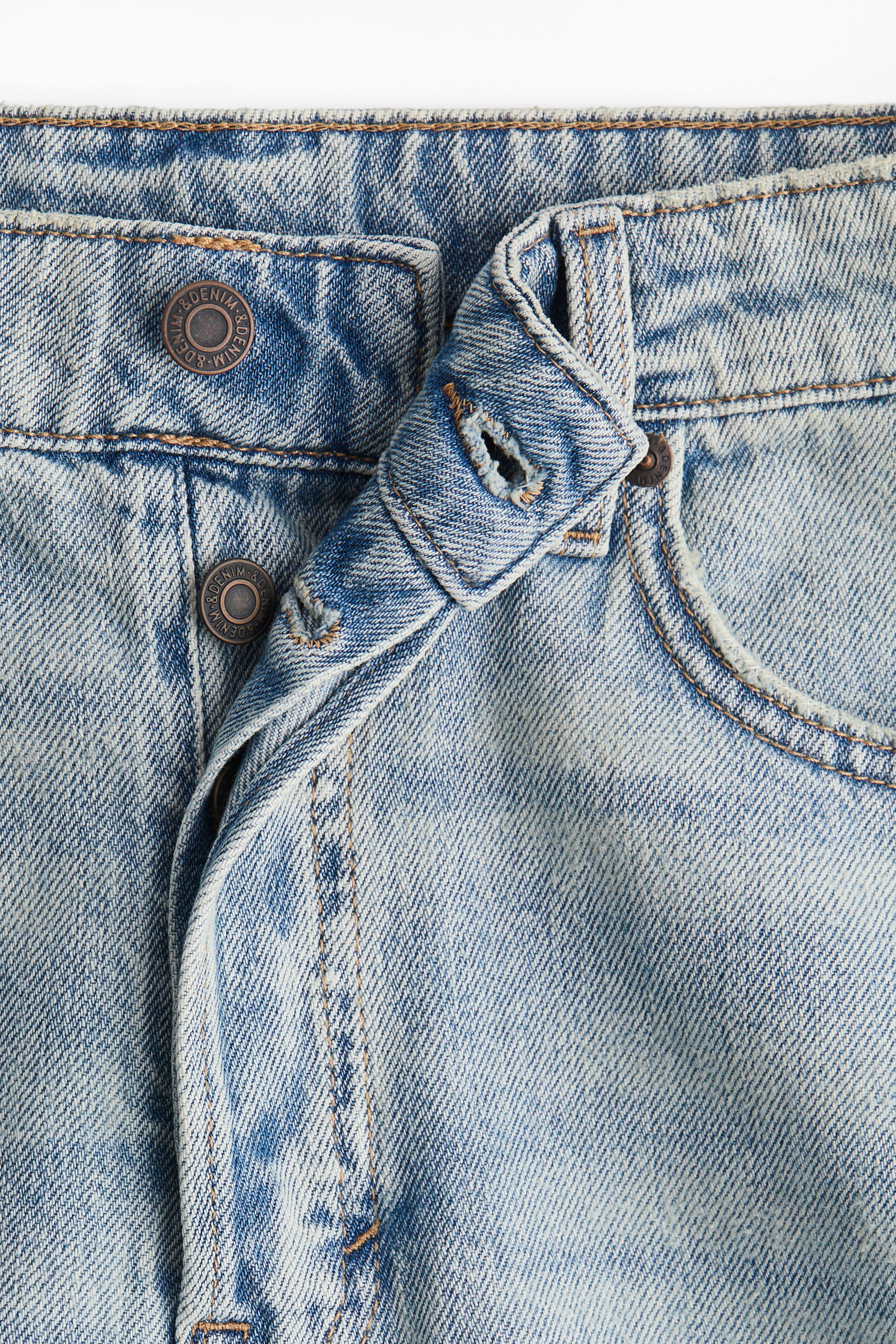 Short en denim haut du genou
