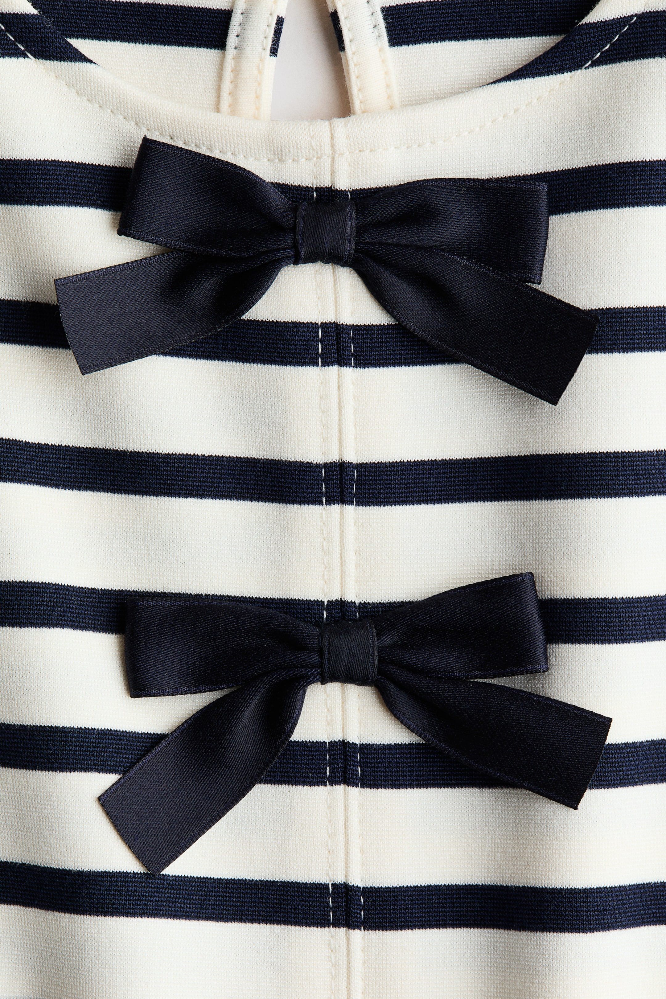 Robe en jersey avec boucles