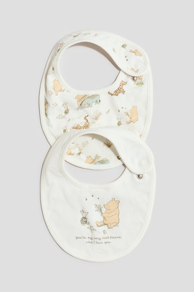 2-Pack Printed Cotton Bibs - White/Winnie the Pooh - 1