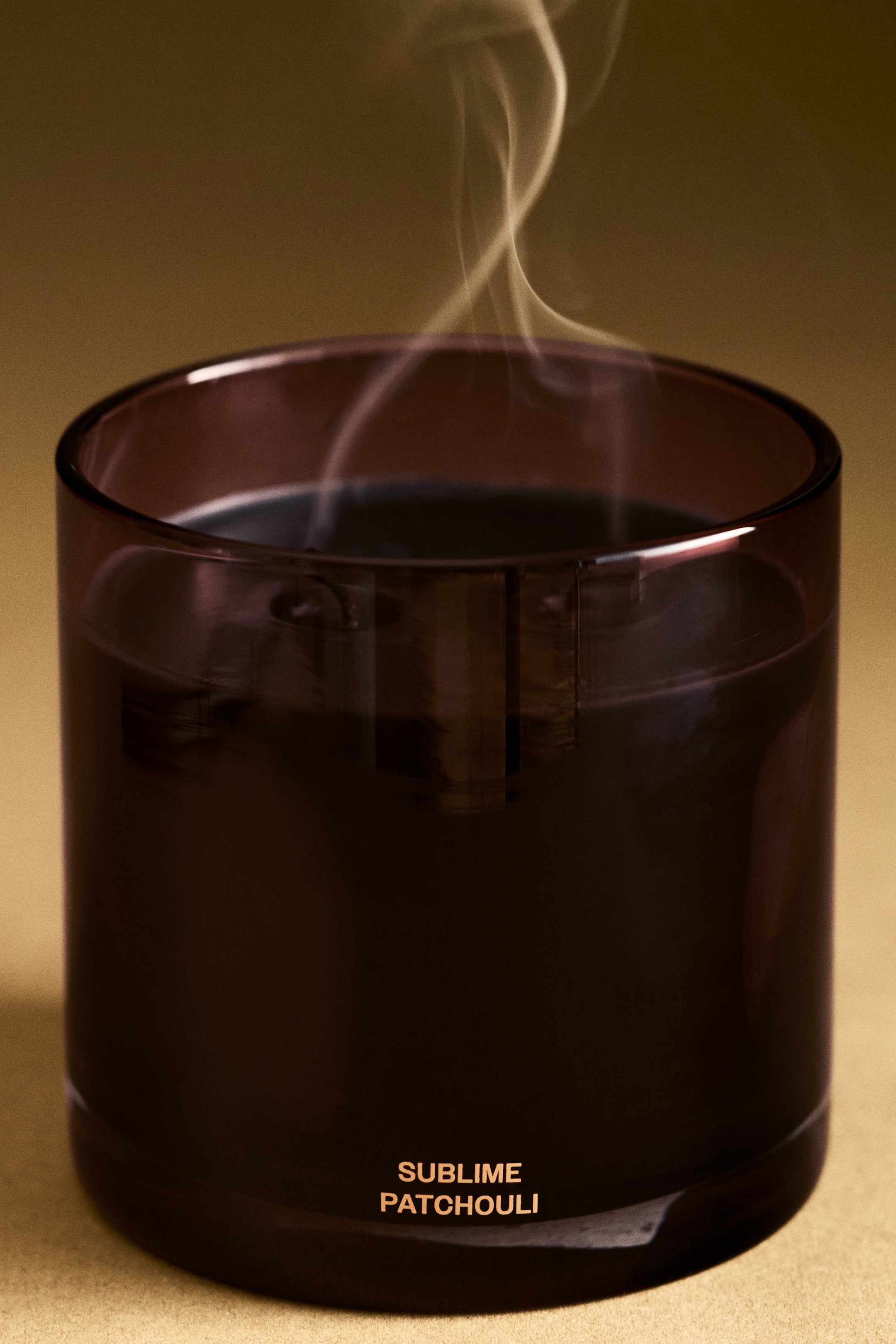 View larger image: Large scented candle in glass holder - Sublime Patchouli - Home All | H&M 1