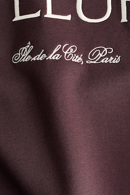 Sweatshirt med textmotiv