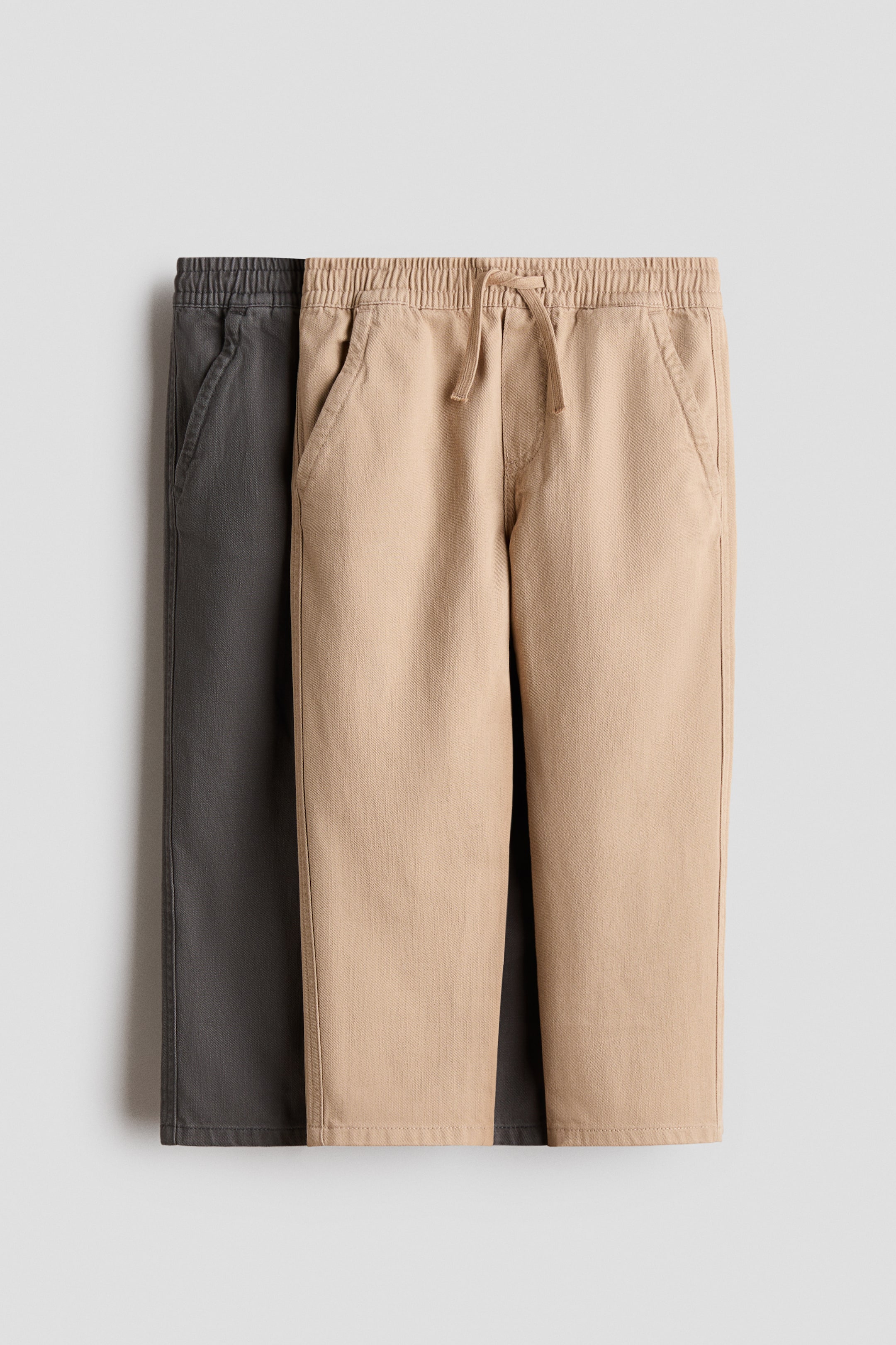 View larger image: 2-pack cotton twill joggers - Beige/Dark grey - Kids | H&M IN 1