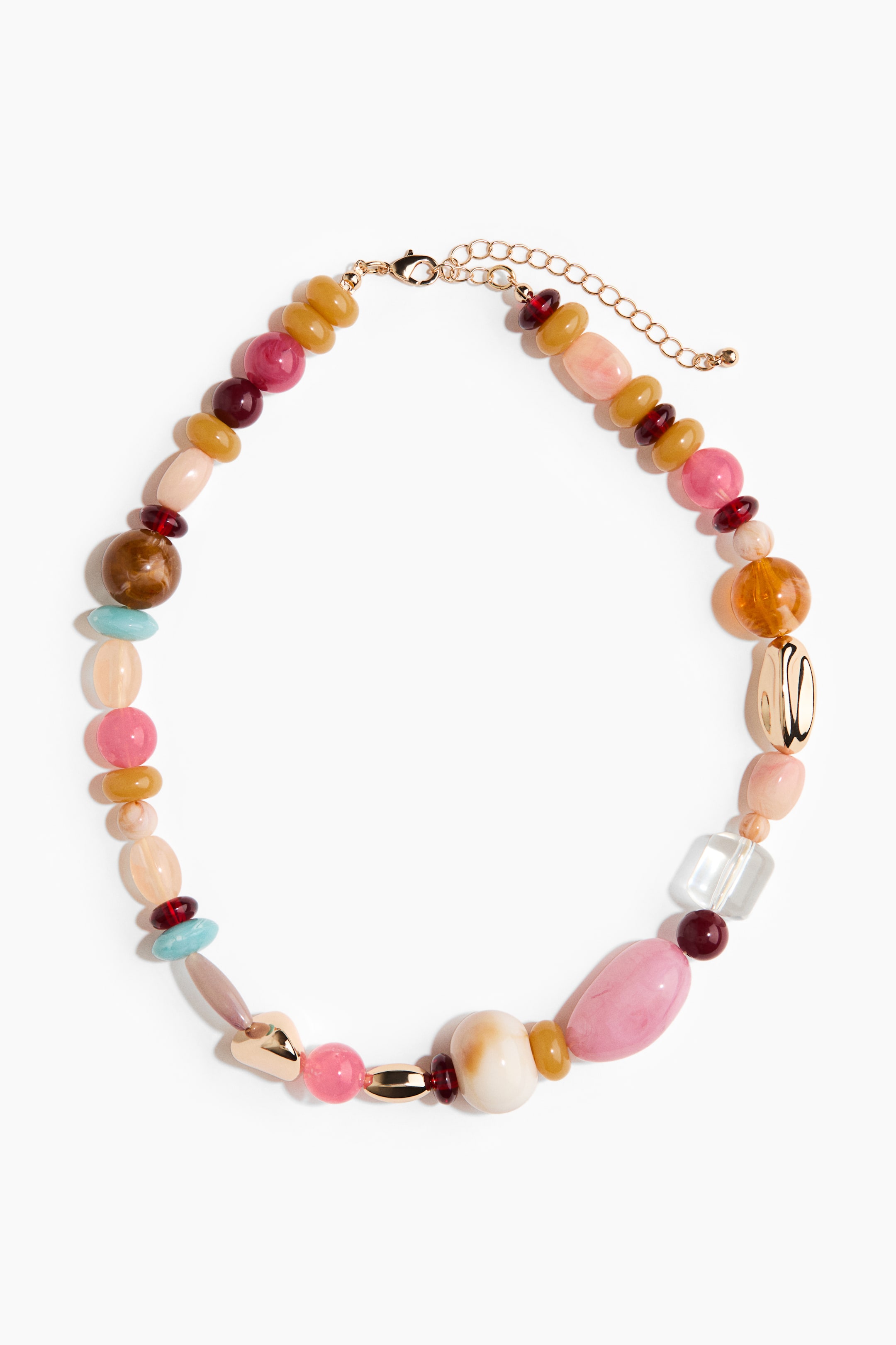 View larger image: The necklace displays a vibrant arrangement of multi-coloured beads in various shapes and sizes, including opaque, translucent, and clear styles. It features shades of pink, yellow, brown, red, and light blue, interspersed with gold-toned metallic elements and secured by a lobster clasp with an extender chain.