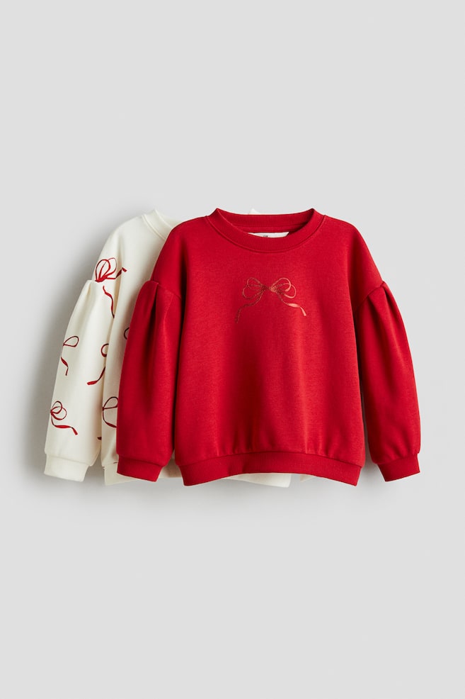 2er-Pack Sweatshirts mit Puffärmeln - Rot/Schleife/Helllila/Regenbögen/Pflaumenlila/Geblümt - 1