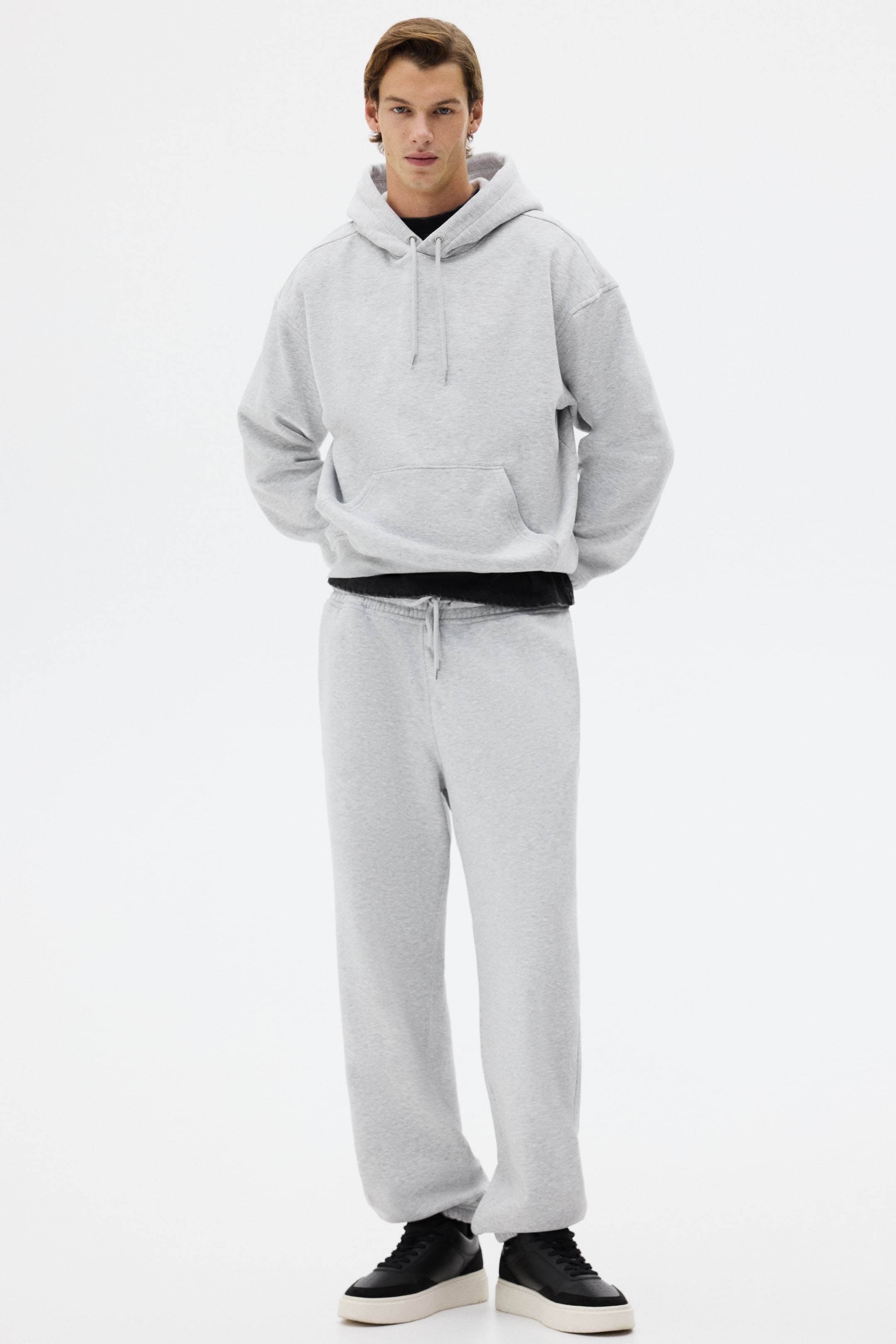 Visualizza immagine più grande: Set 2 pezzi felpa e joggers Loose Fit - Grigio mélange - UOMO | H&M IT 1