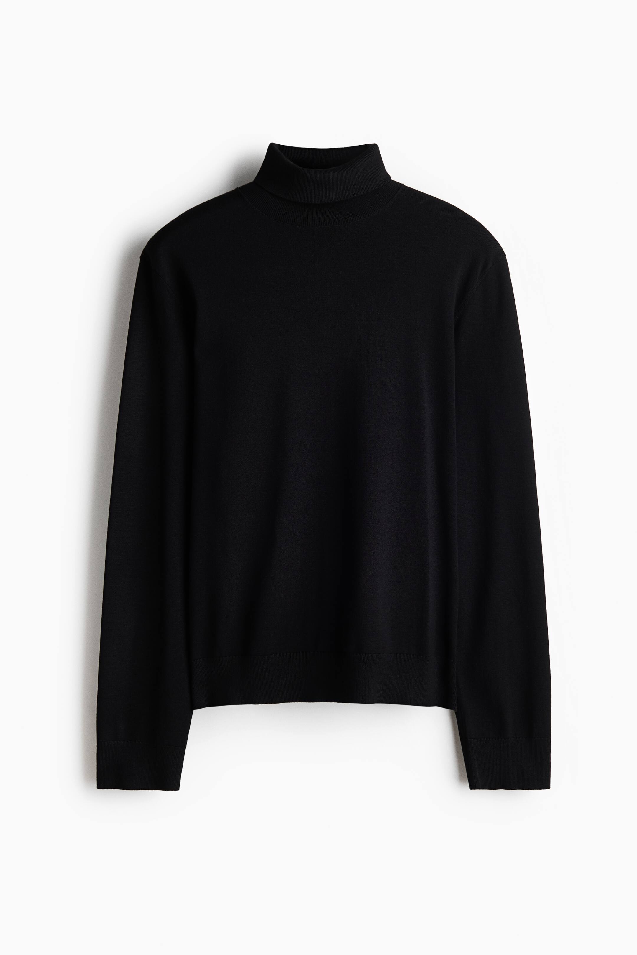 View larger image: A black turtleneck sweater is shown from the front, featuring a high, folded collar and long sleeves. The sweater displays a smooth knit texture with straight cuffs and a straight hem.
