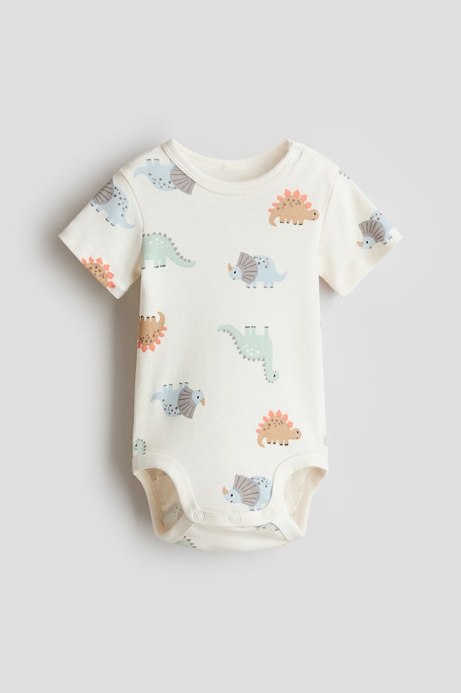 Printed Bodysuit - Light beige/dinosaurs/Light dusty pink/hearts/Light khaki green/vehicles/Light pink/strawberries/White/vehicles/Yellow/lemons/Navy blue/sailboats/Turquoise/marine life/Cream/seashells/Cream/sailboats/Cream/floral - 1