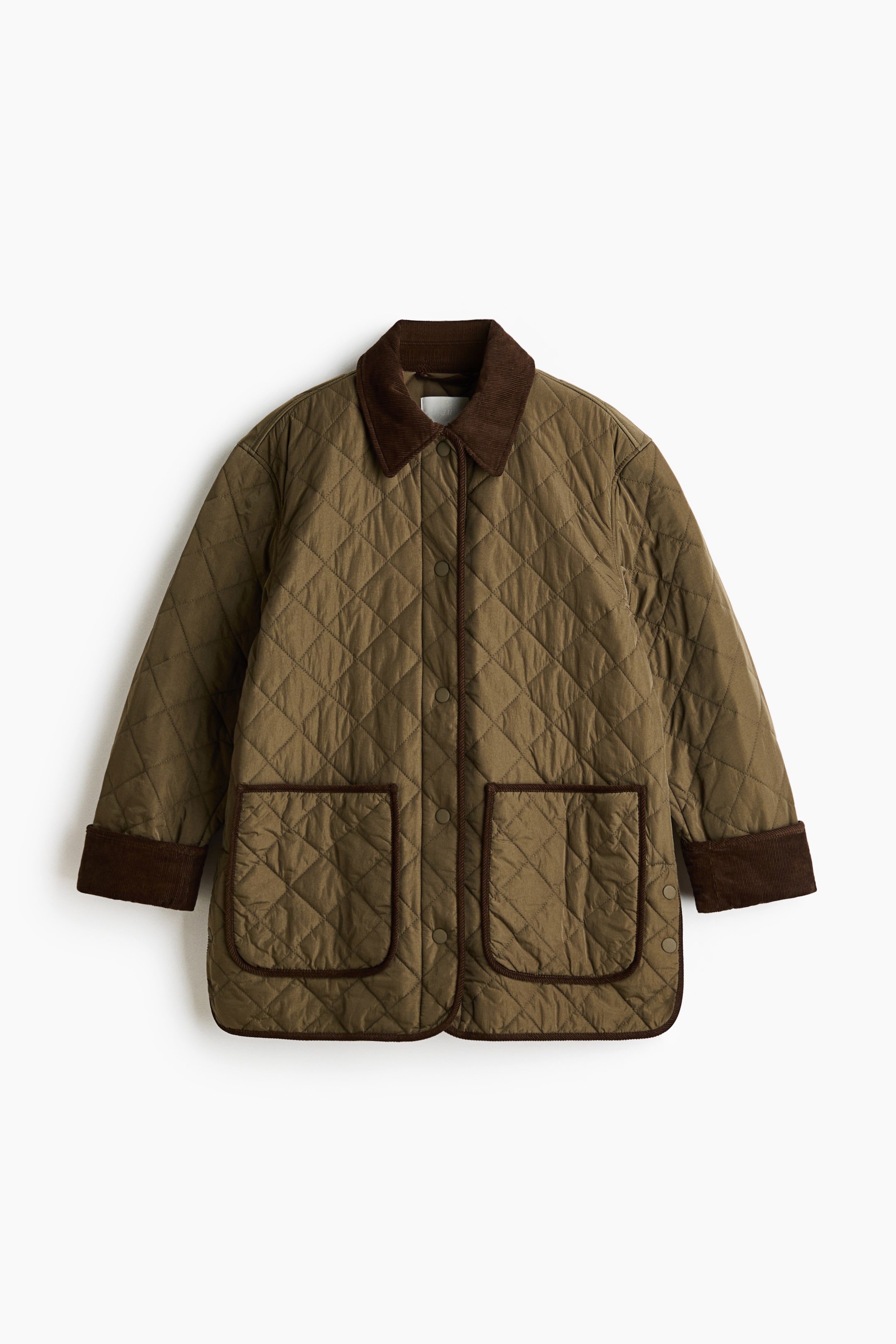 View larger image: A quilted jacket is shown from the front, featuring an olive green diamond-quilted body with a brown corduroy collar and snap-button closures. It has two large patch pockets trimmed with brown corduroy, and the sleeves are rolled up to reveal brown corduroy cuffs.
