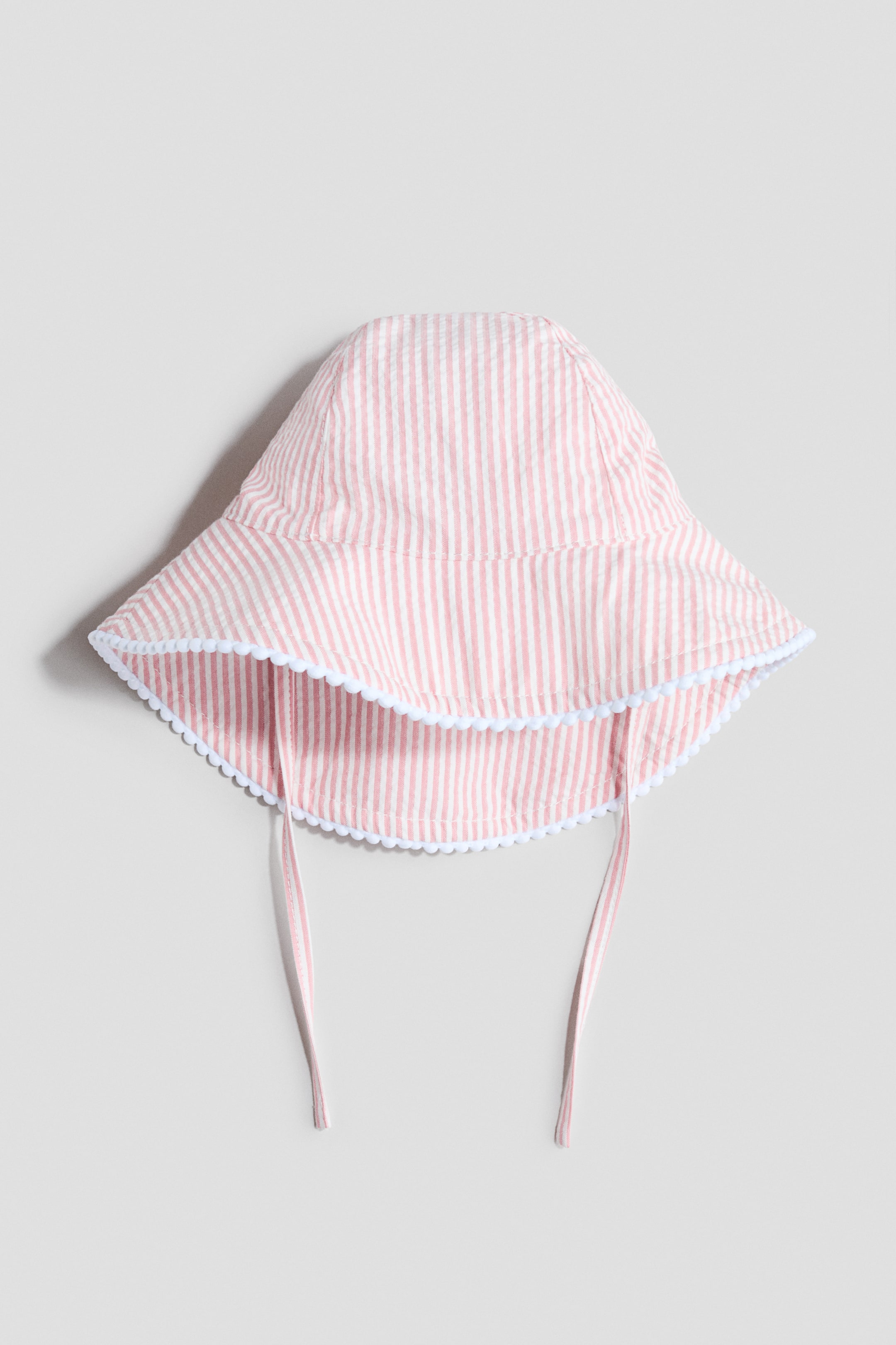 Größeres Bild ansehen: Gemusterter Sonnenhut aus Baumwolle - Rosa/Weiß gestreift - Kids | H&M DE 1