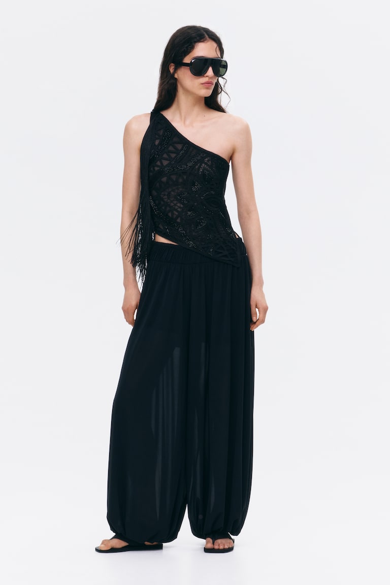 Bluza na jedno rame s ukrasima