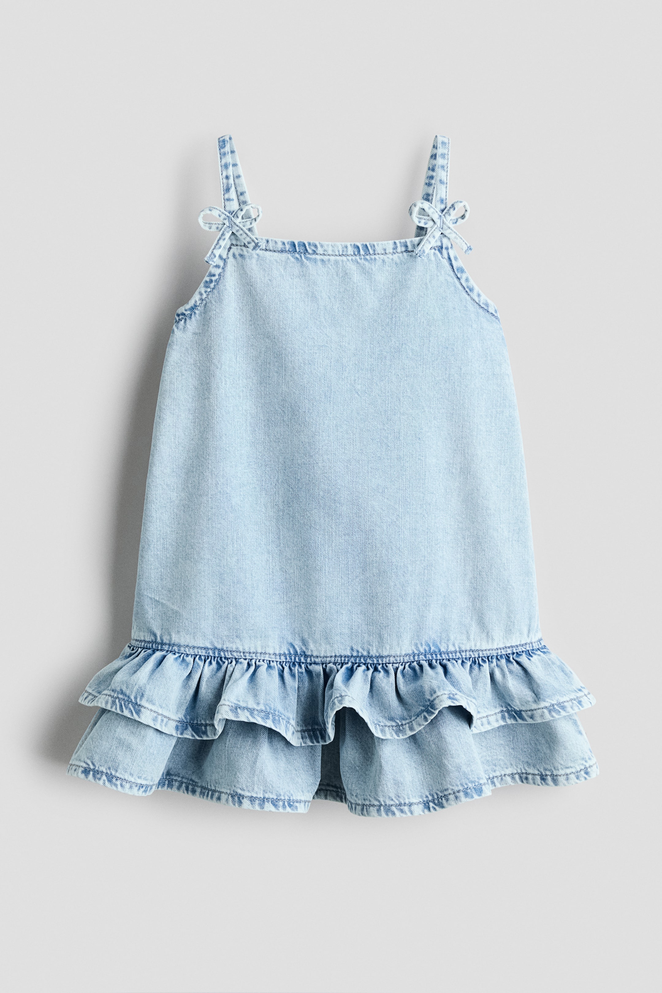 View larger image: Bow-detail denim dress - Light denim blue - Kids | H&M 1