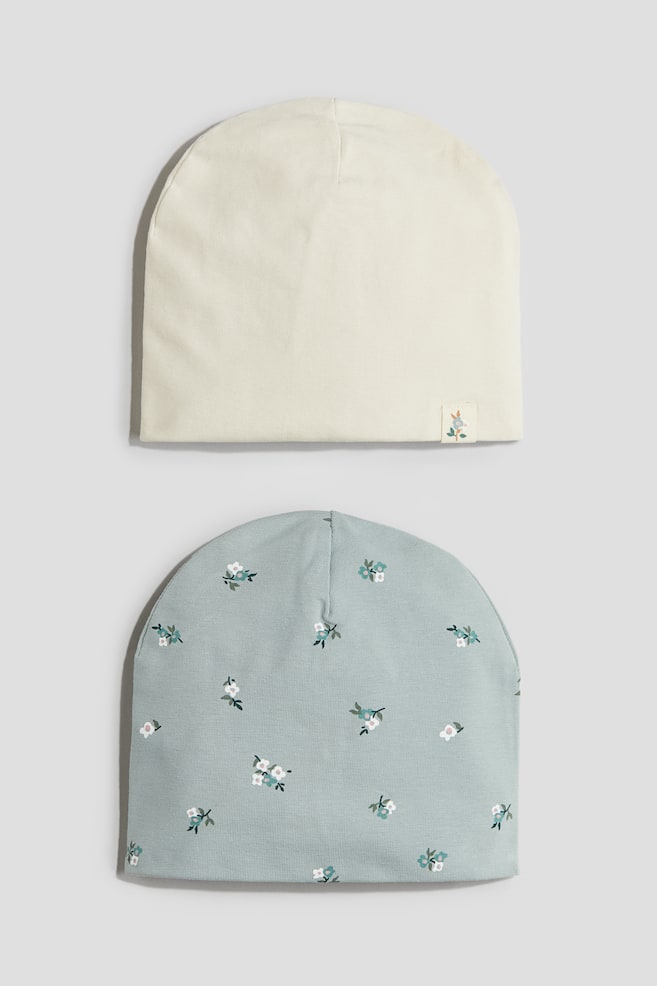Lot de 2 bonnets en jersey de coton - Turquoise/fleuri/Rose clair/cerises - 1