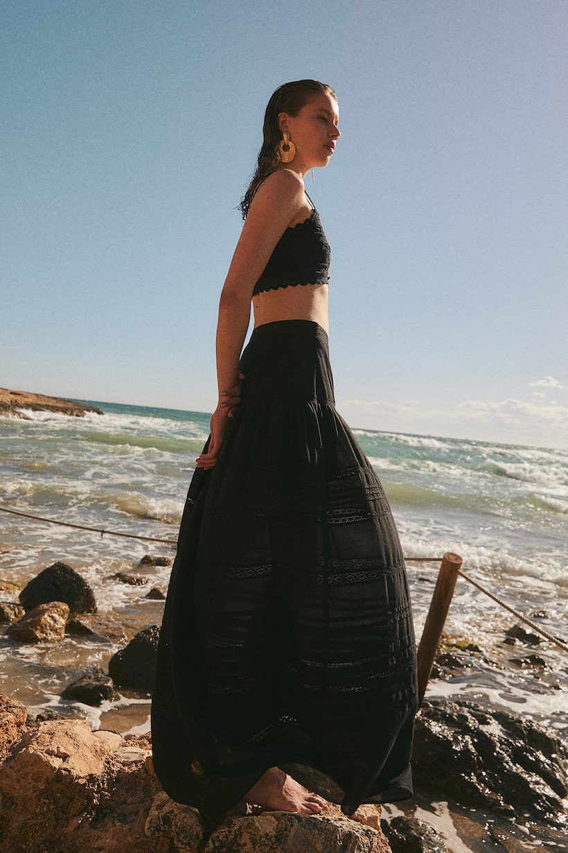 H&M black Long, A-line skirt in an airy cotton weave with pintucks and lace insets. High waist with a concealed zip at one side. Lined.