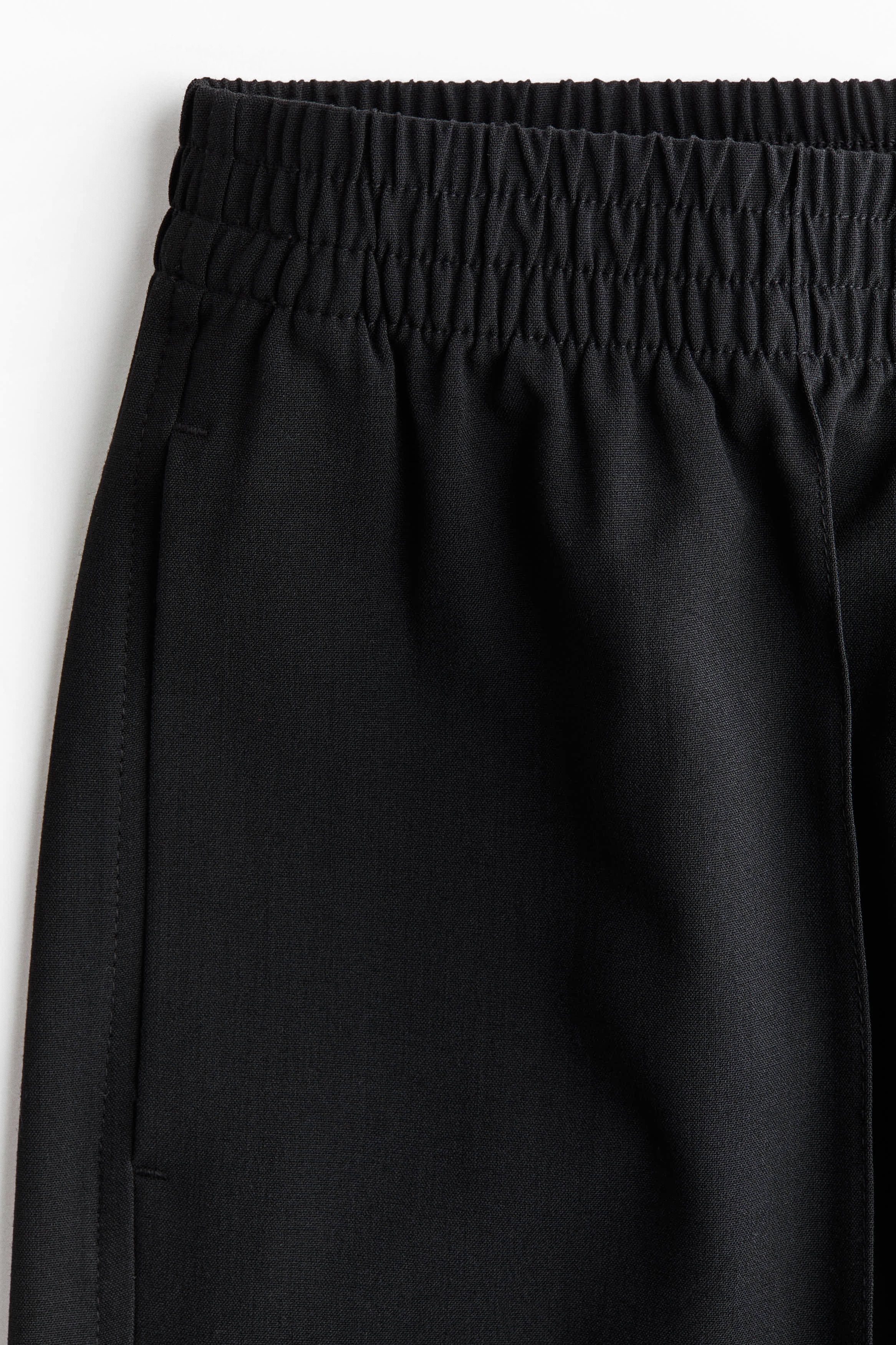 Crease-leg trousers