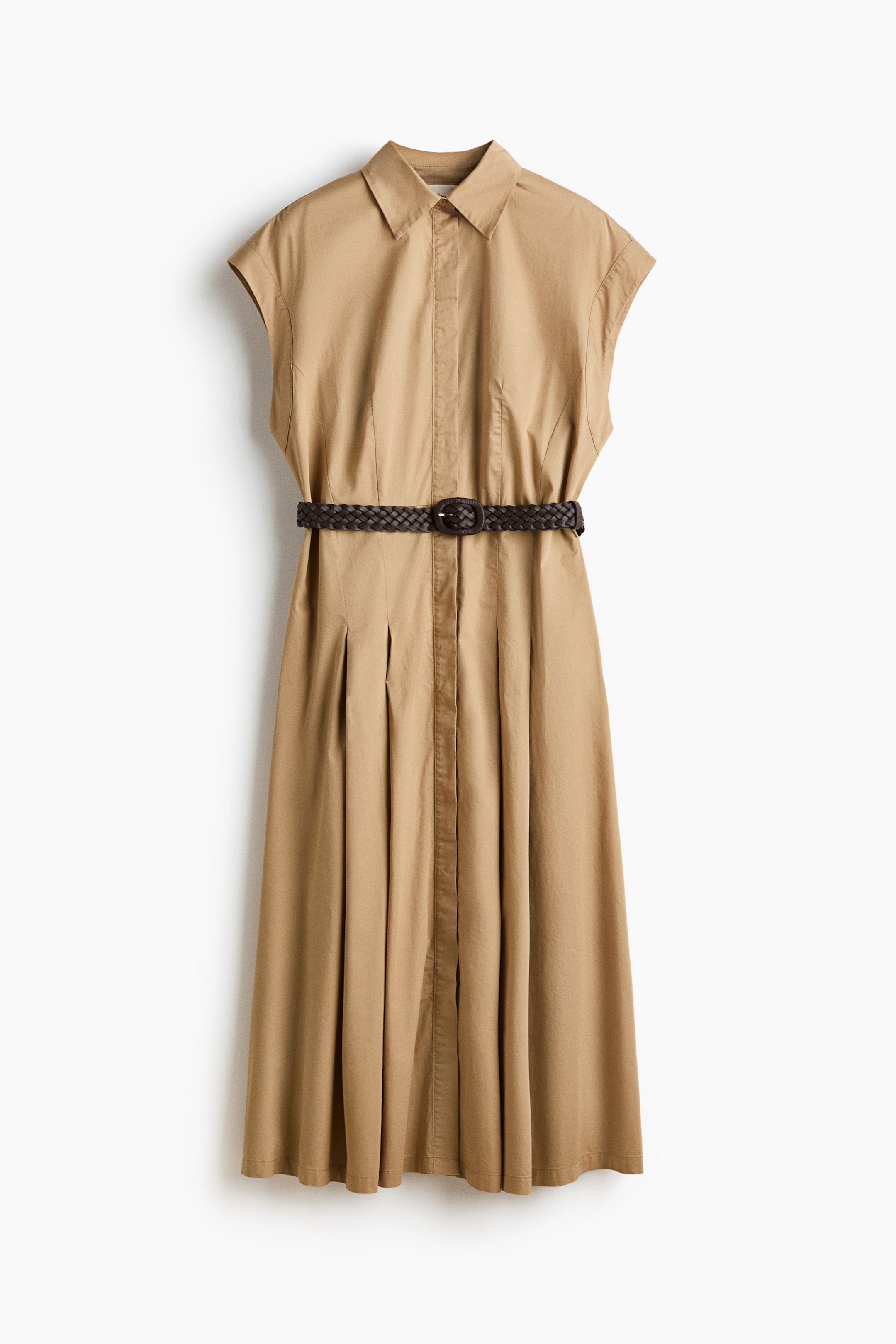 View larger image: A tan calf-length dress in crisp cotton poplin is presenting from the FRONT, featuring a collar, concealed buttons down the front, and cap sleeves. A dark braided belt is cinching the waist, above a gently flared skirt with pleats.