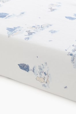 Mönstrat dra-på-lakan i percale