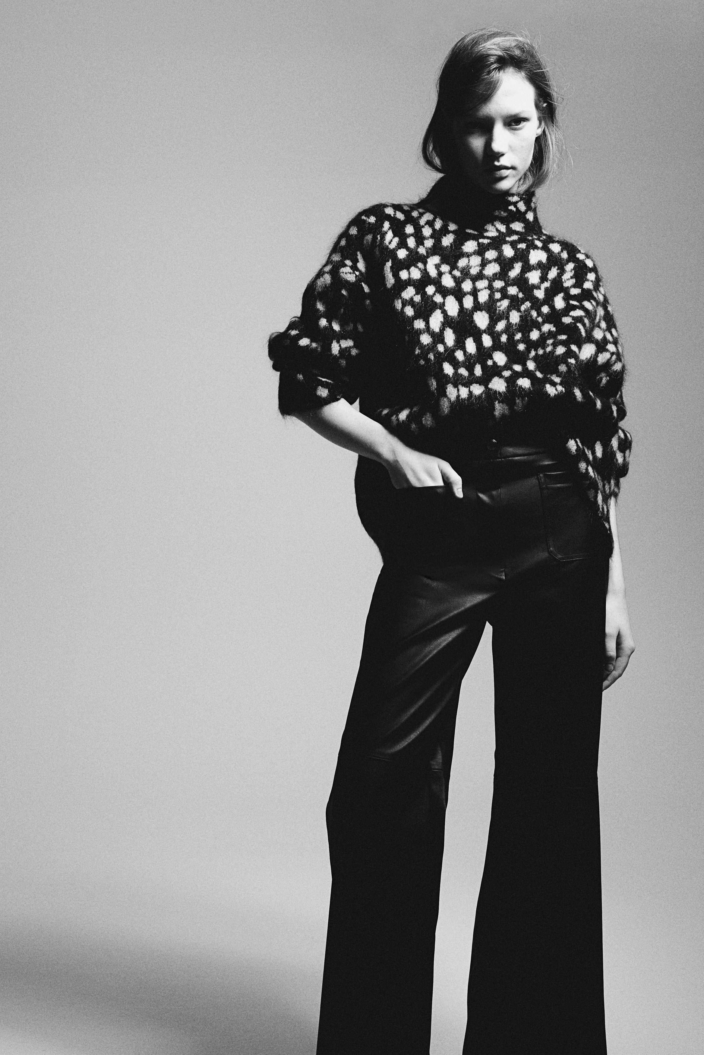 Flared coated trousers