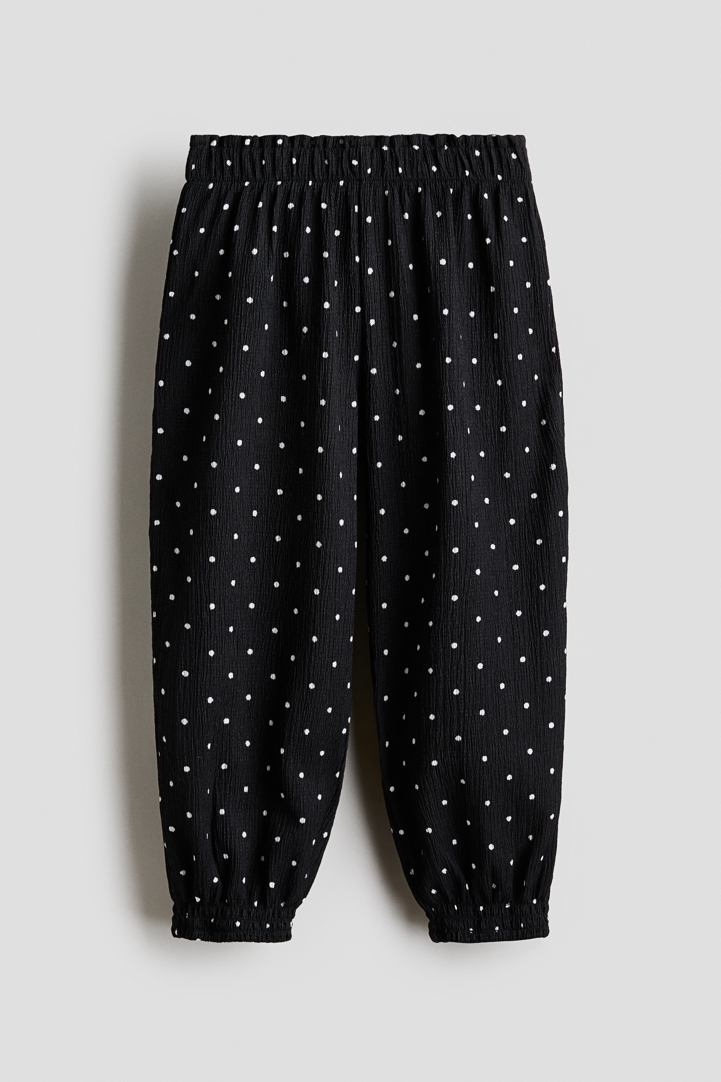 Black/dotted Textured Jersey Pants for kids | H&M US