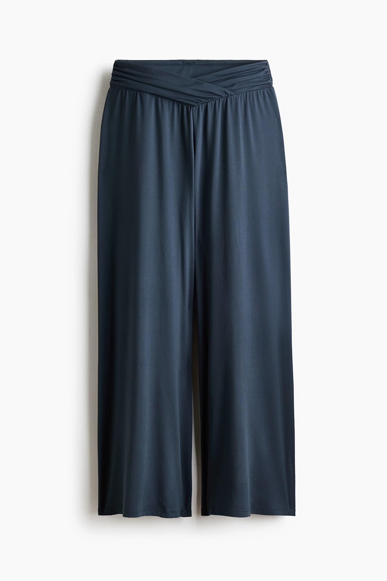 Dark blue wide-leg trousers feature a ruched waistband with a crossover design at the front. - 1