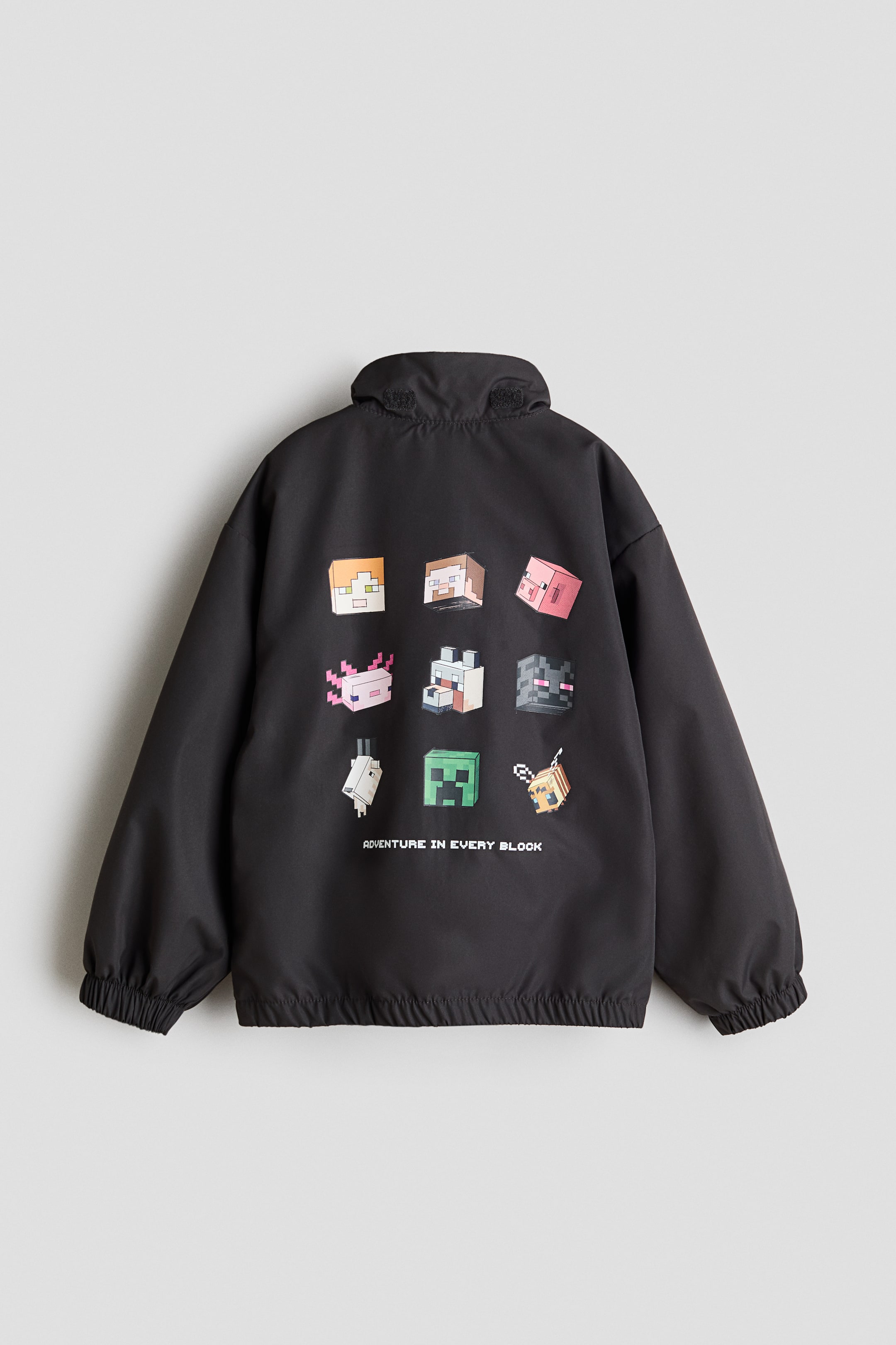 Veste coupe-vent à capuche
