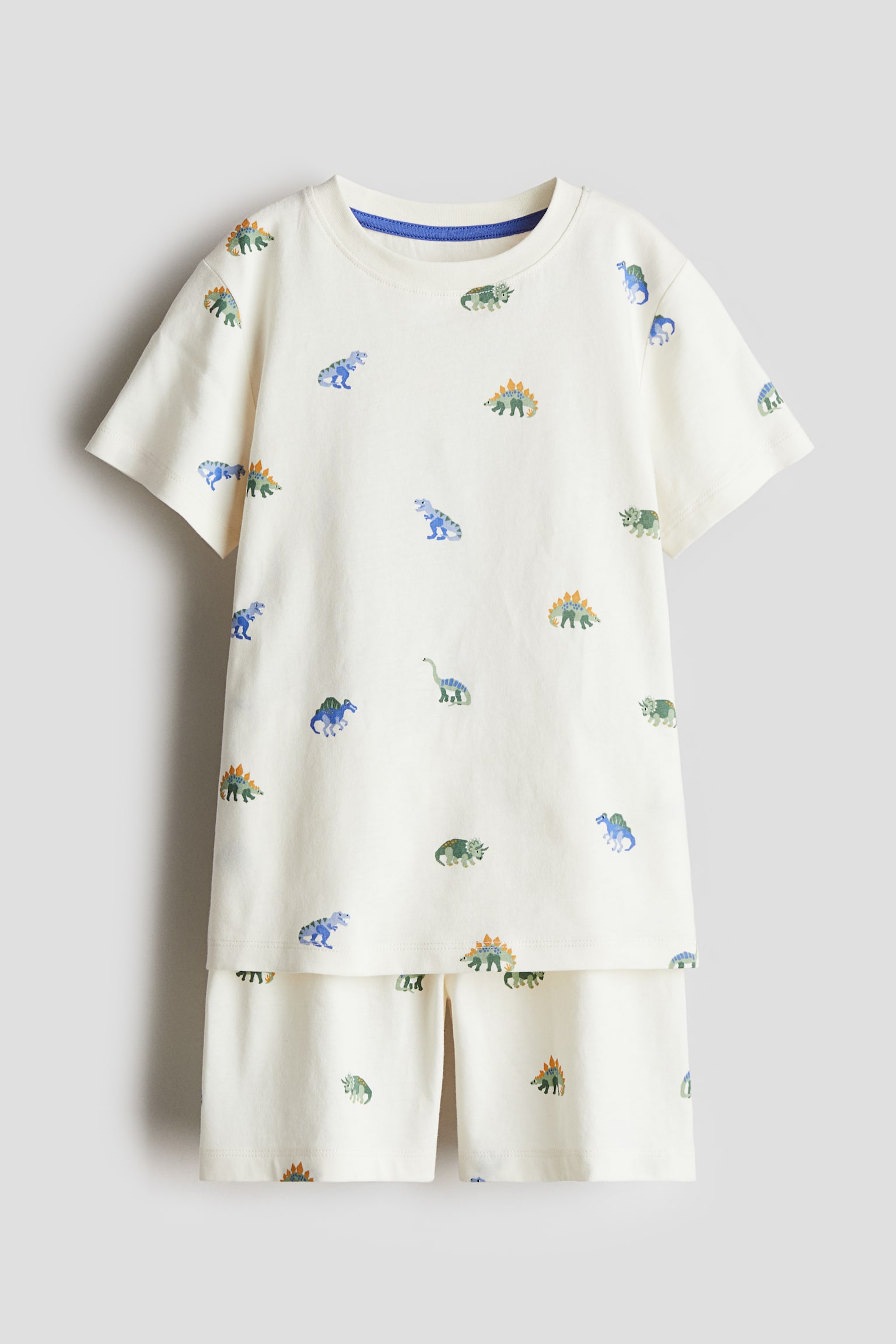 Printed cotton pyjamas - Natural white/Dinosaurs/Dark blue/Patterned/Black/Footballs/Light grey marl/Footballs/Light blue/Dinosaur - 1