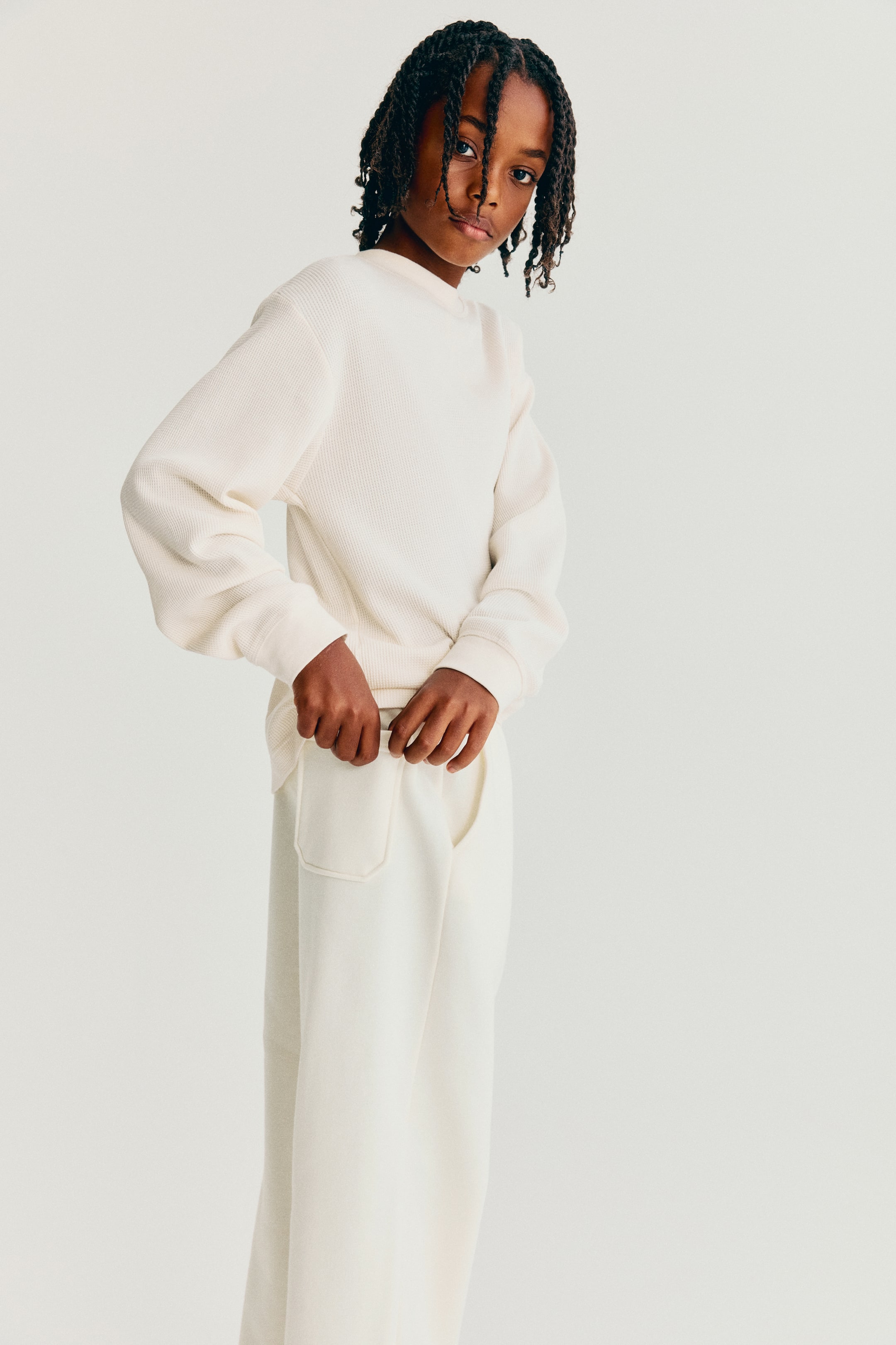 View larger image: Wide brushed-inside joggers - Cream - Kids | H&M 1