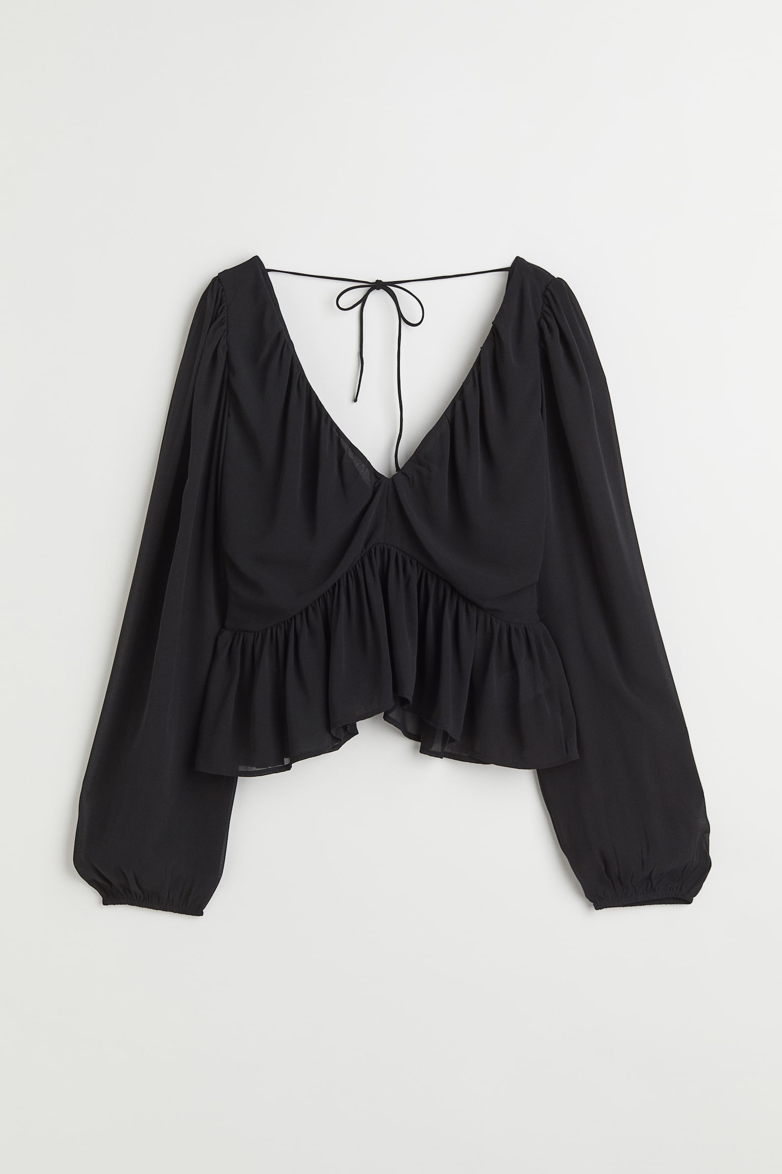 Peplumbluse med V-udskæring - Sort