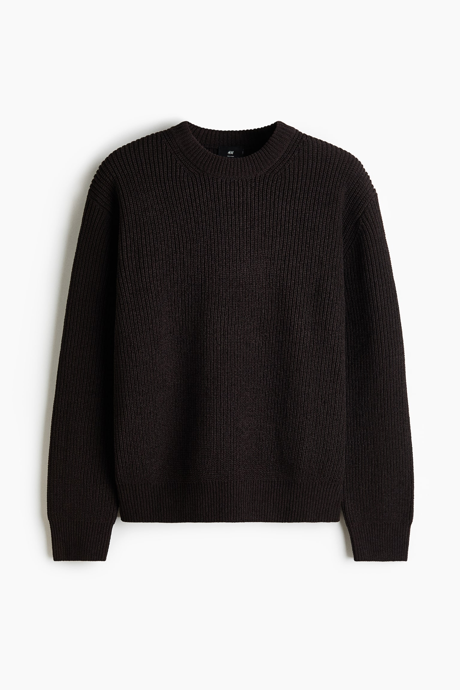 A dark brown ribbed knit sweater is being displayed, featuring a crew neck and ribbed cuffs and hem. - 1