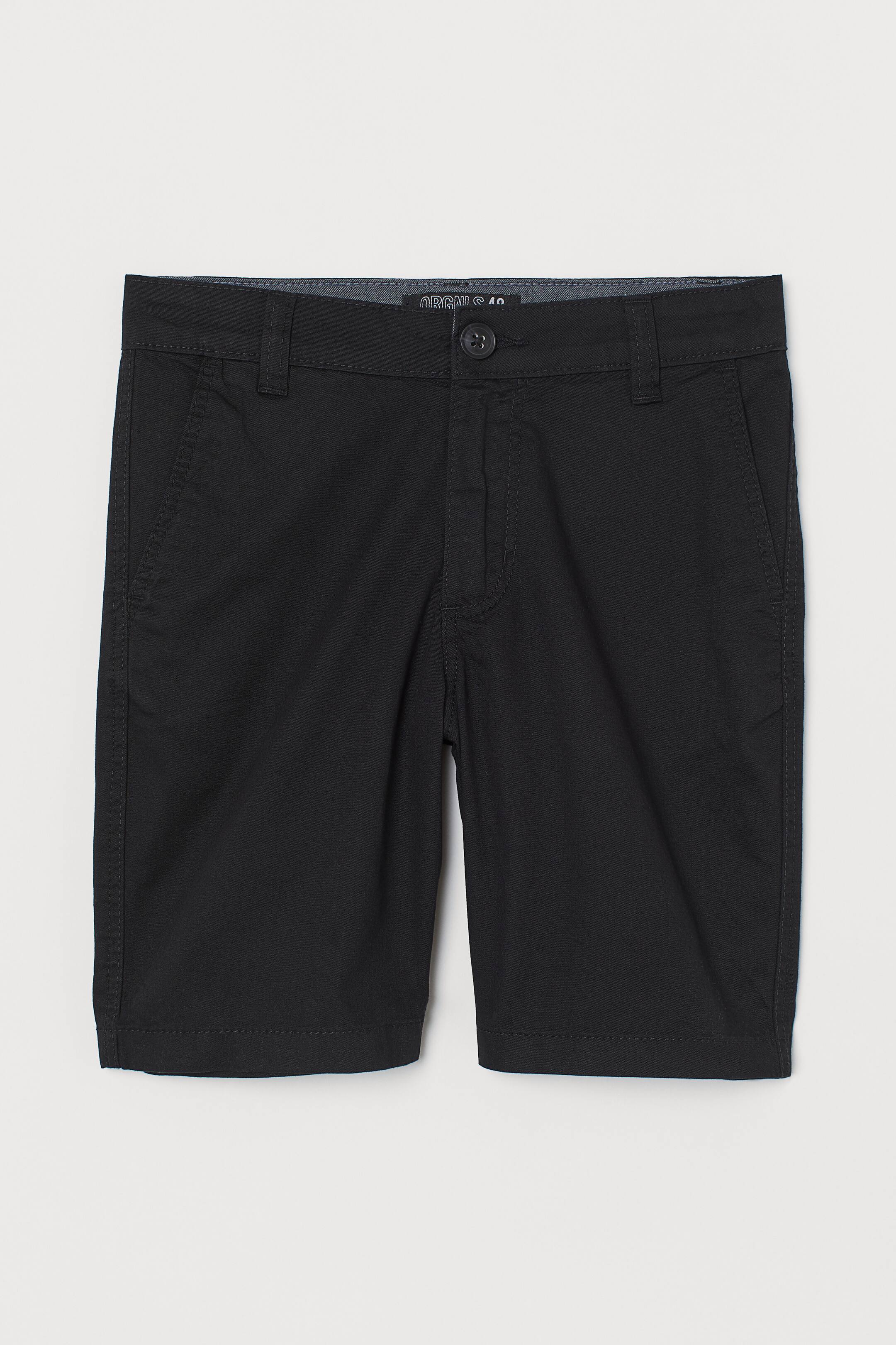 Zobacz większy obraz: Bawełniane szorty chinos - Czarny - Dziecko | H&M PL 1