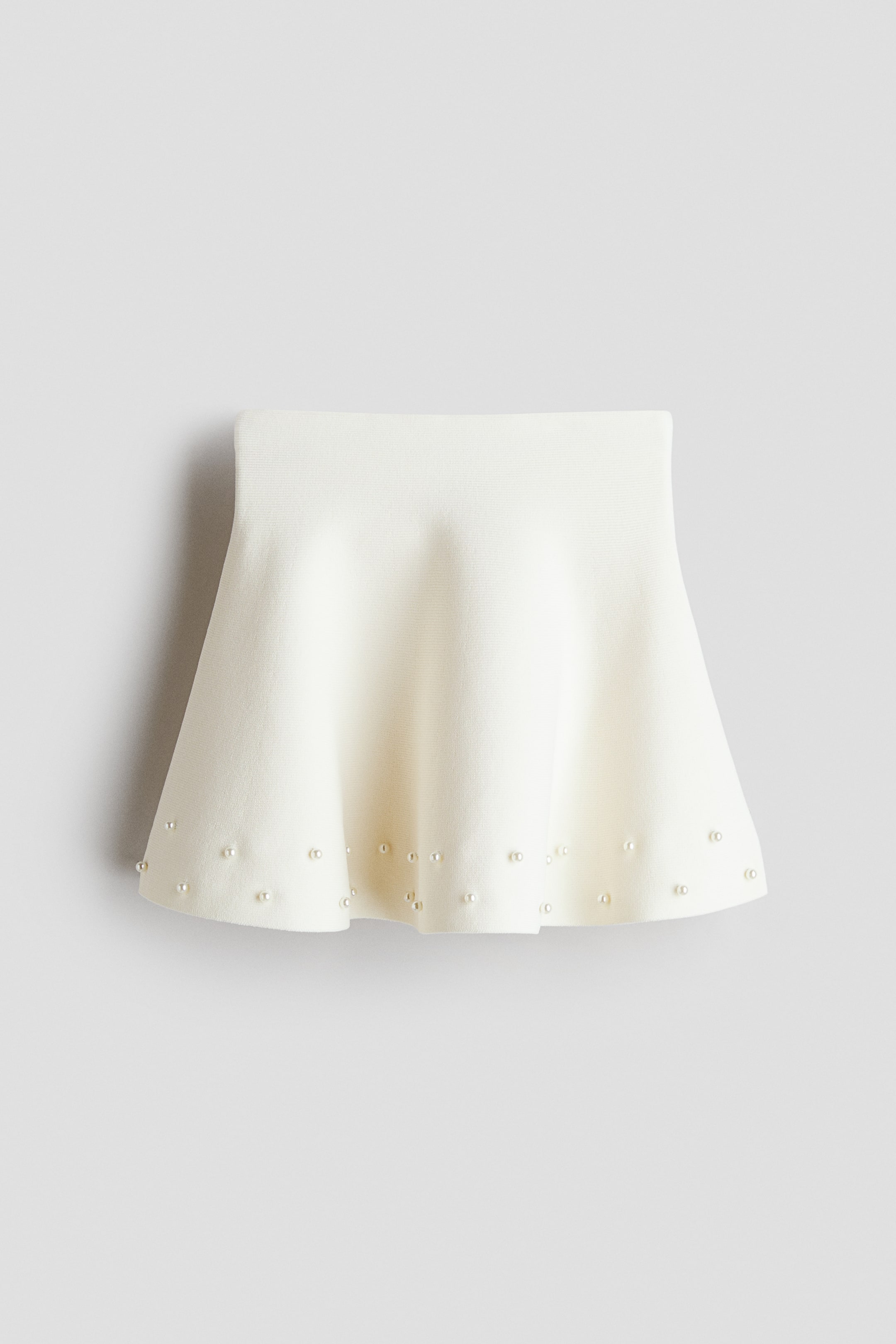 Jupe en tricot fin avec perles fantaisie