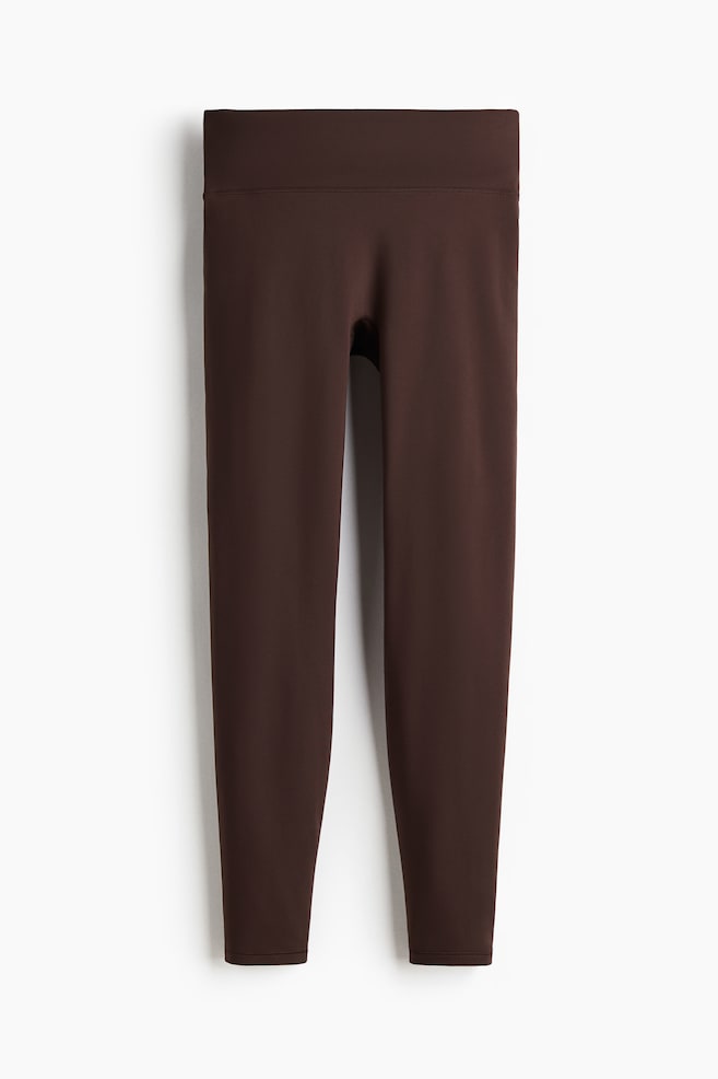 Sport-Fleeceleggings mit SoftMove™ - Warmes Braun/Schokoladiges Pflaumenlila - 1