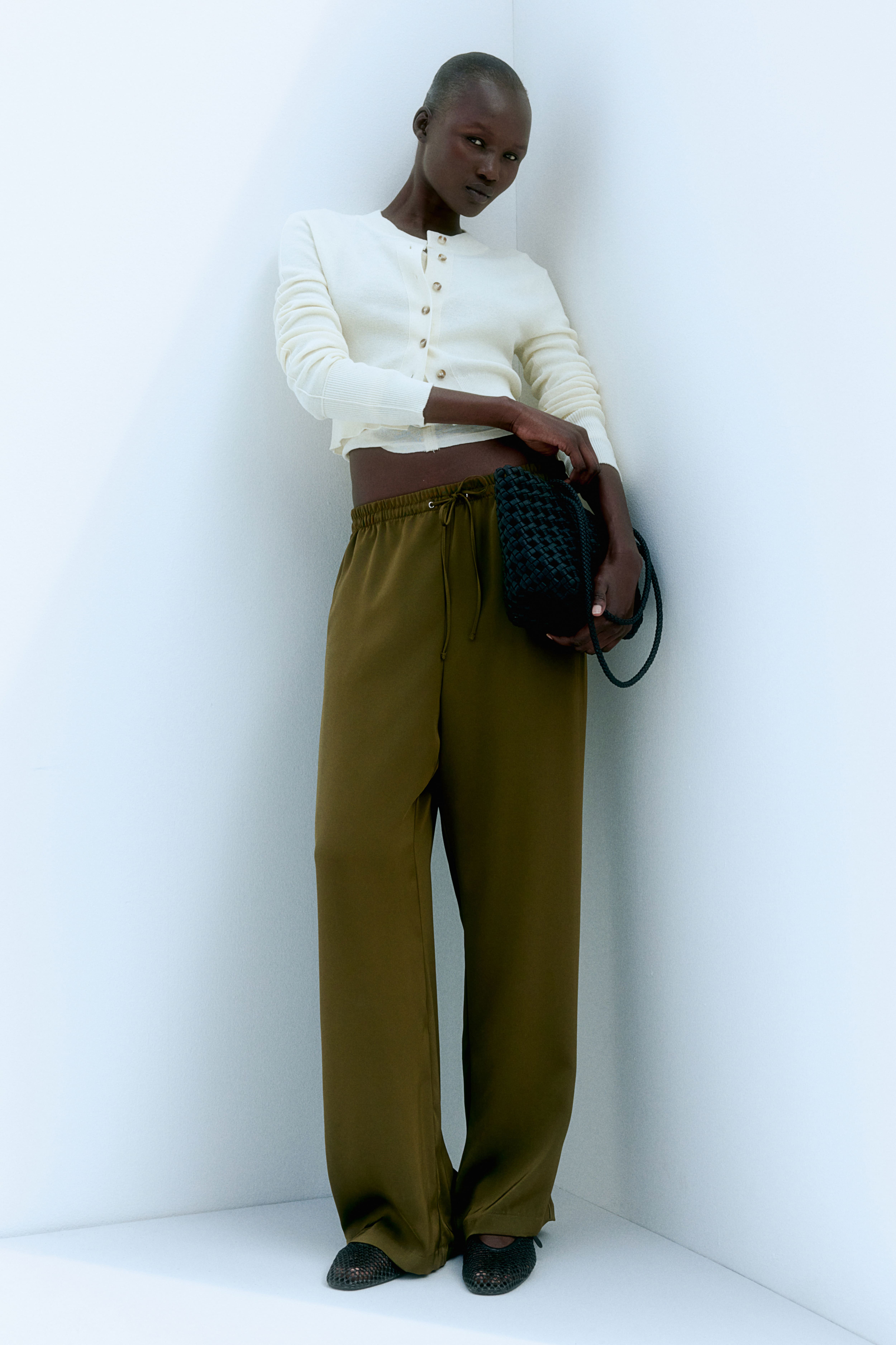 Black shirt olive green pants online