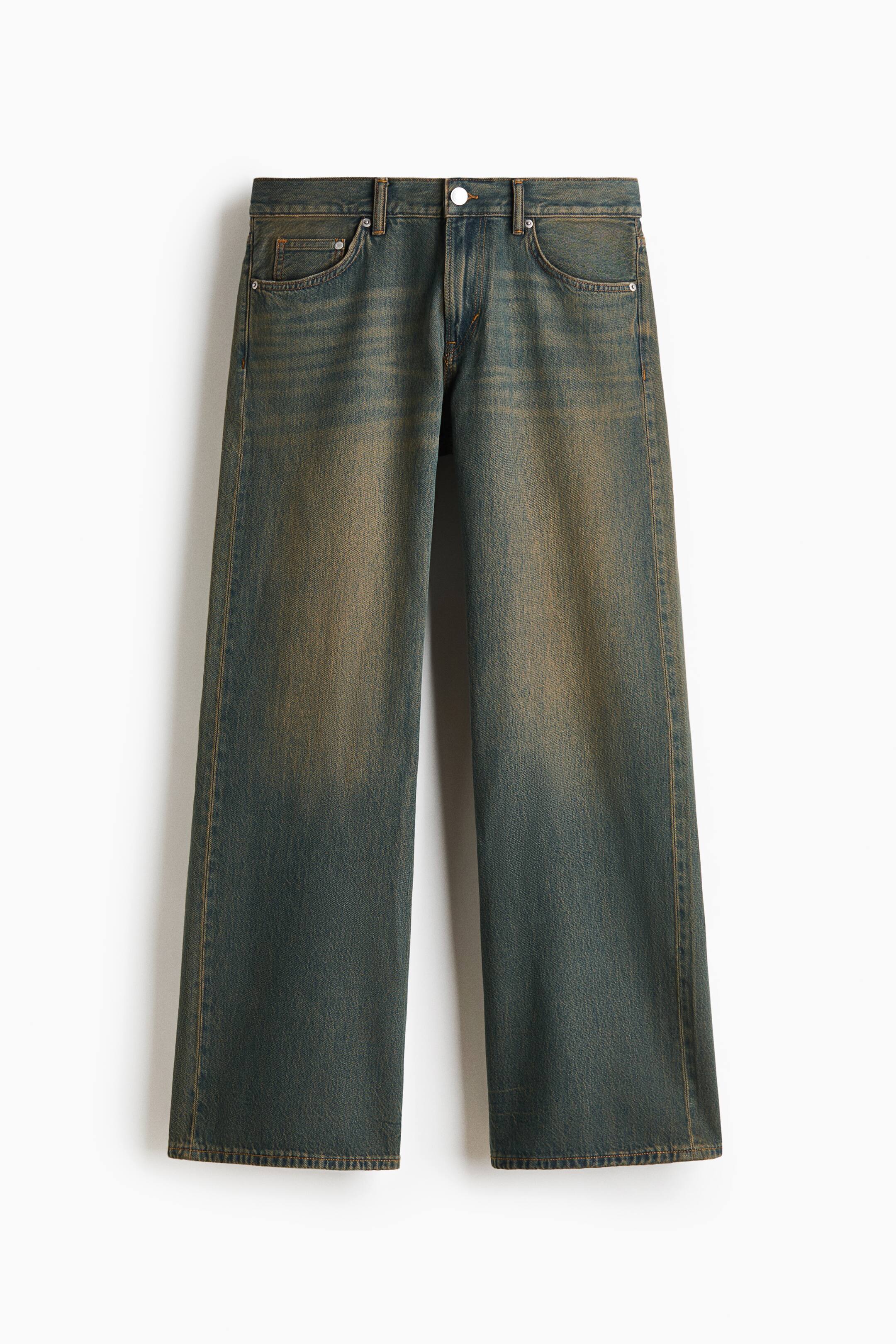 View larger image: Five-pocket jeans in dark blue cotton denim with a vintage-style yellowish wash are shown from the front. The jeans feature a regular waist with belt loops, a zip fly with a silver button closure, and a relaxed fit with wide, straight-cut legs.