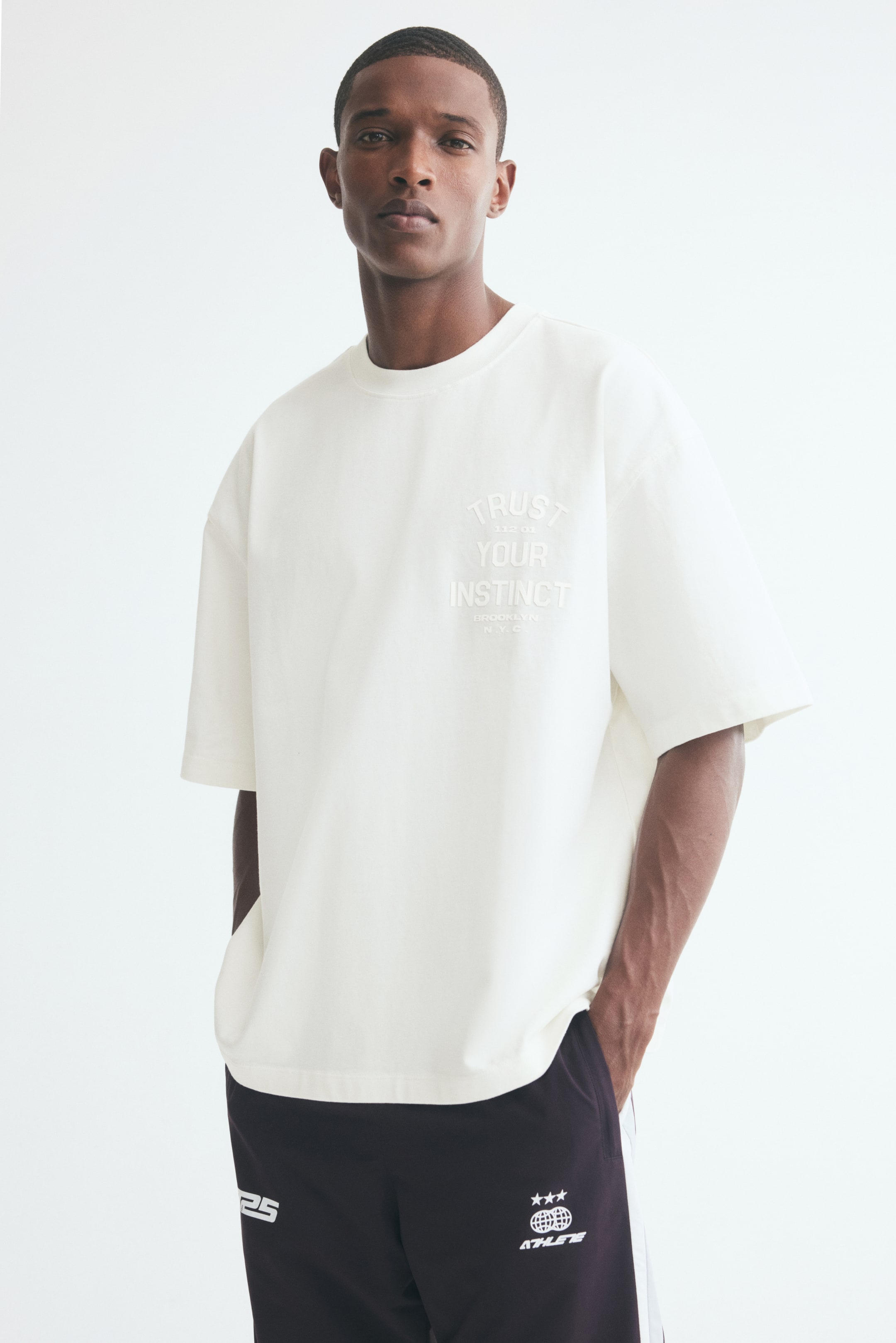 View larger image: Oversized Fit Motif-detail cotton T-shirt - Ivory - Men | H&M 1