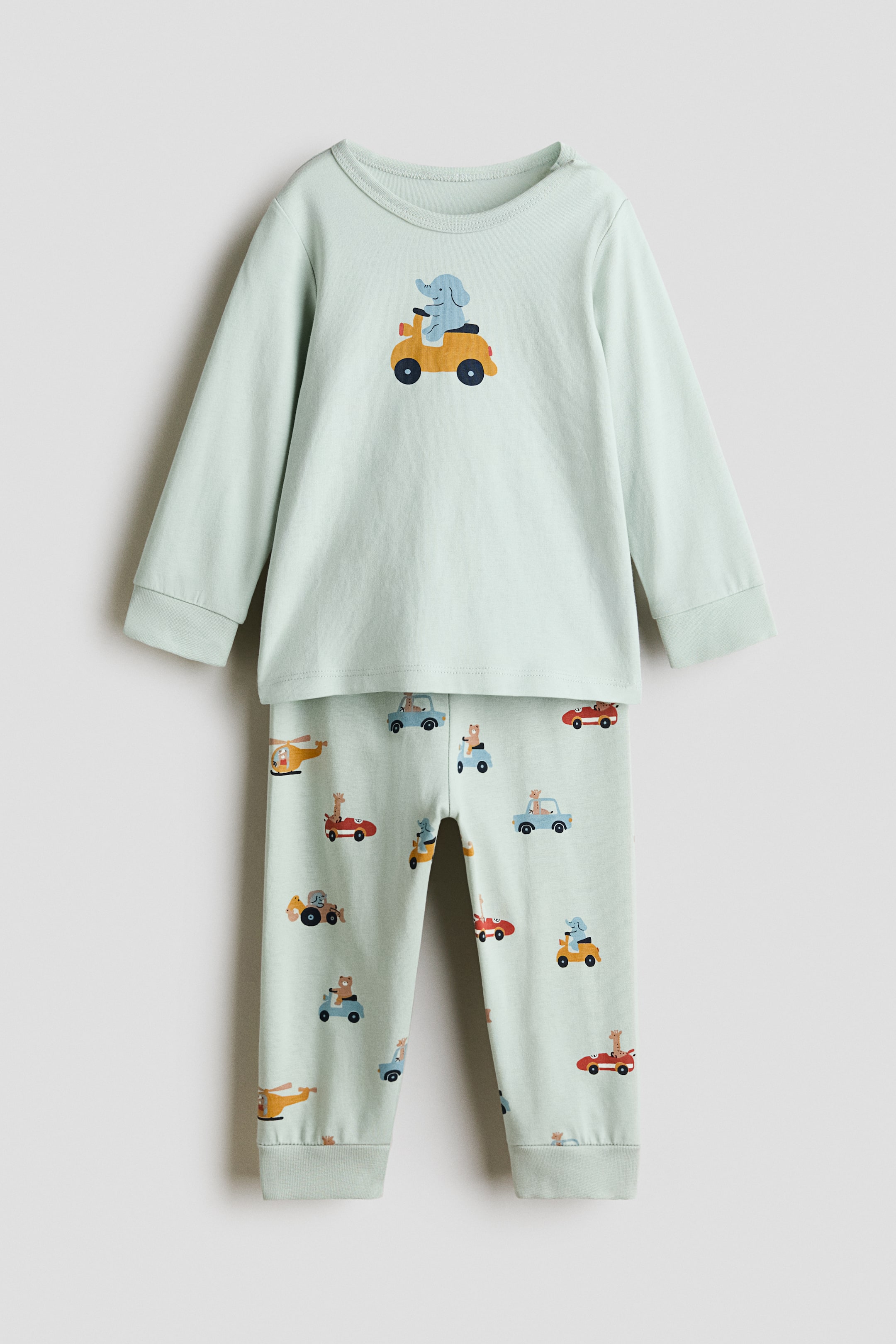 Visualizza immagine più grande: Pigiama in cotone con stampa - Verde polvere chiaro/veicoli - BAMBINO | H&M IT 1