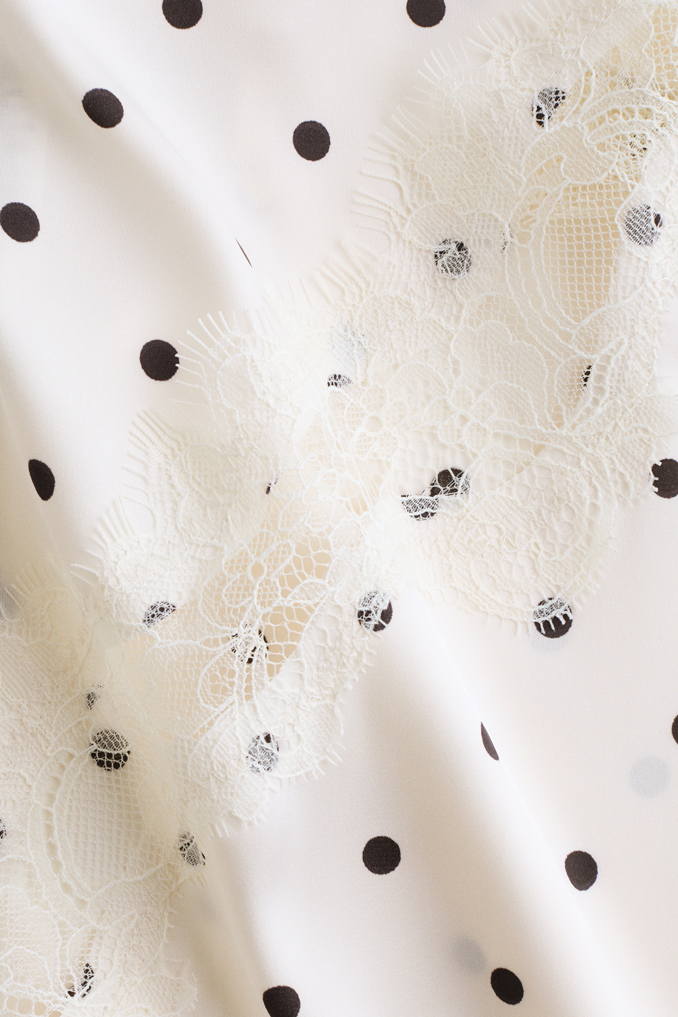Lace-trimmed asymmetric nightslip