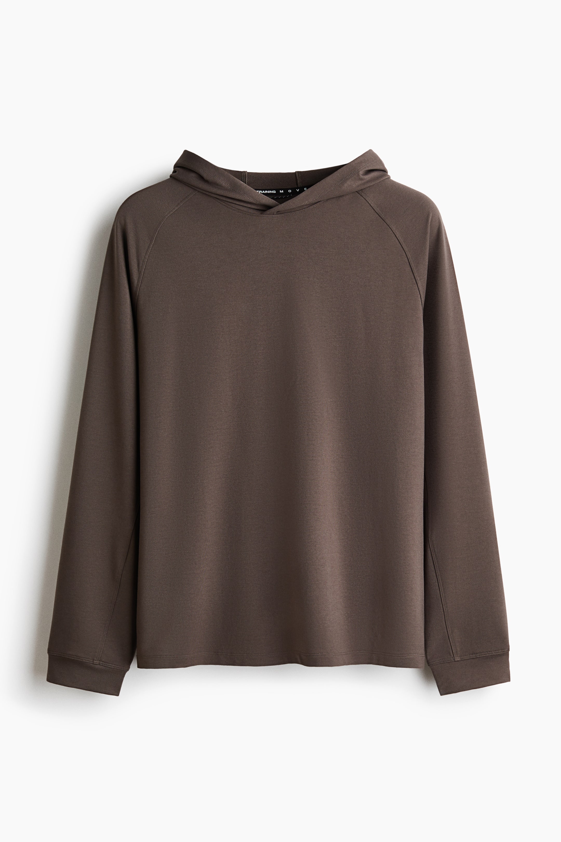 View larger image: A dark brown hoodie facing front is showcasing a clean, minimalist design with raglan sleeves and ribbed cuffs. The long-sleeved pullover is presenting a drawstring-free hood and a straight, clean-finished hem.