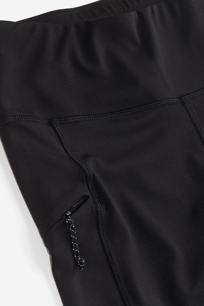 DryMove™ Pocket-detail running tights - Black/Bright purple - 7